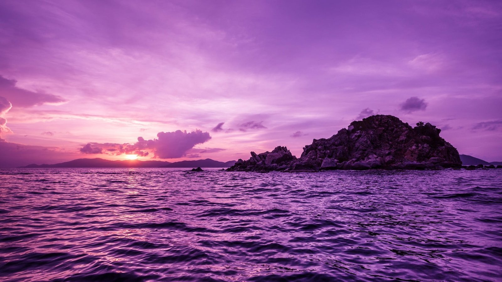 sea and island wallpaper Pelican Island purple sky water 2k