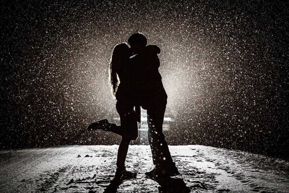 silhoutte photography of man and woman kissing love snow monochrome