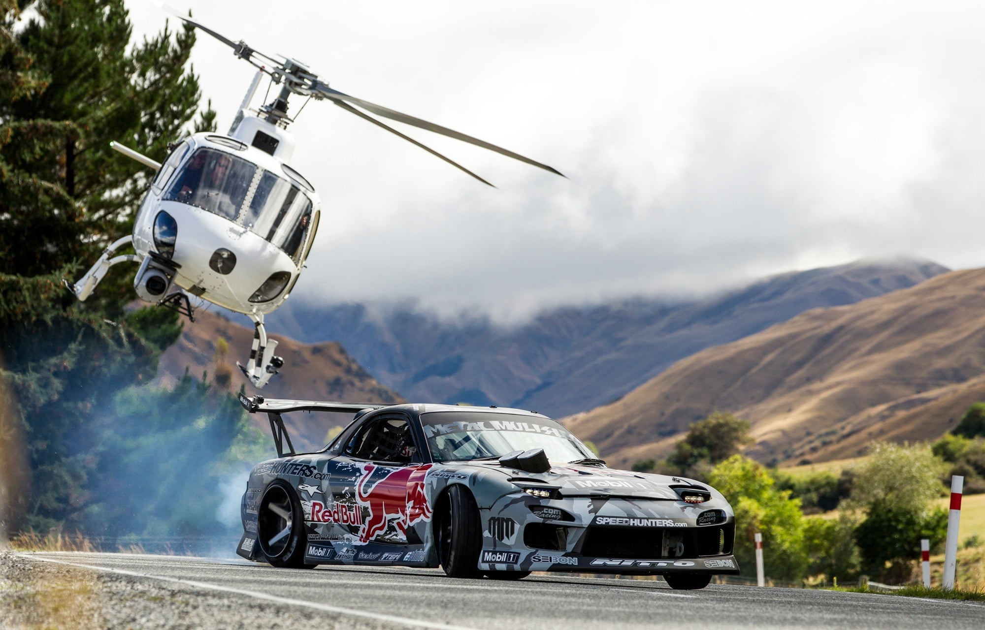 white helicopter Mountains Drift Mazda Red Bull Mad Mike 2k