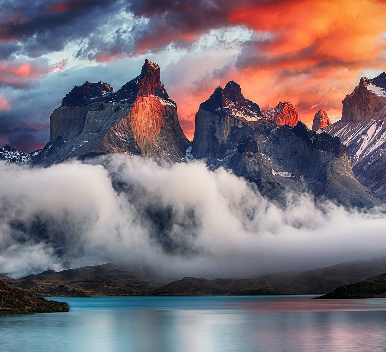 mountain near body of water during golden hour mountains Torres del Paine