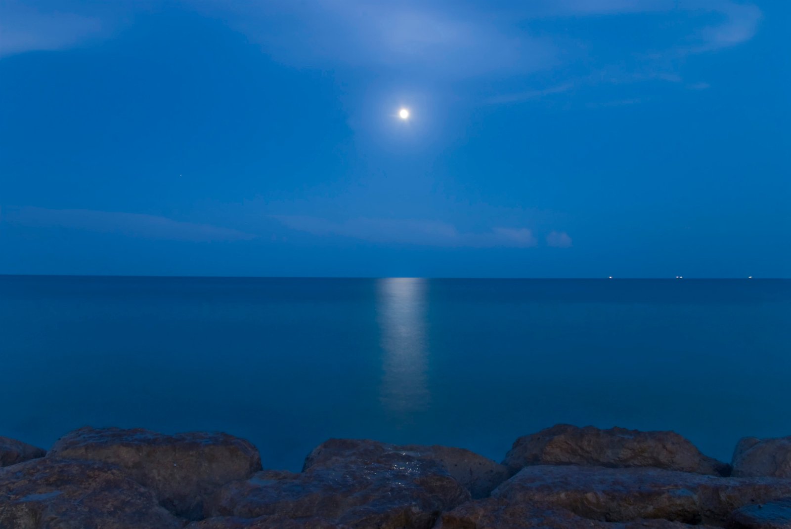 photo of moon during night time Deep Blue nikon mar sea 2k 4k