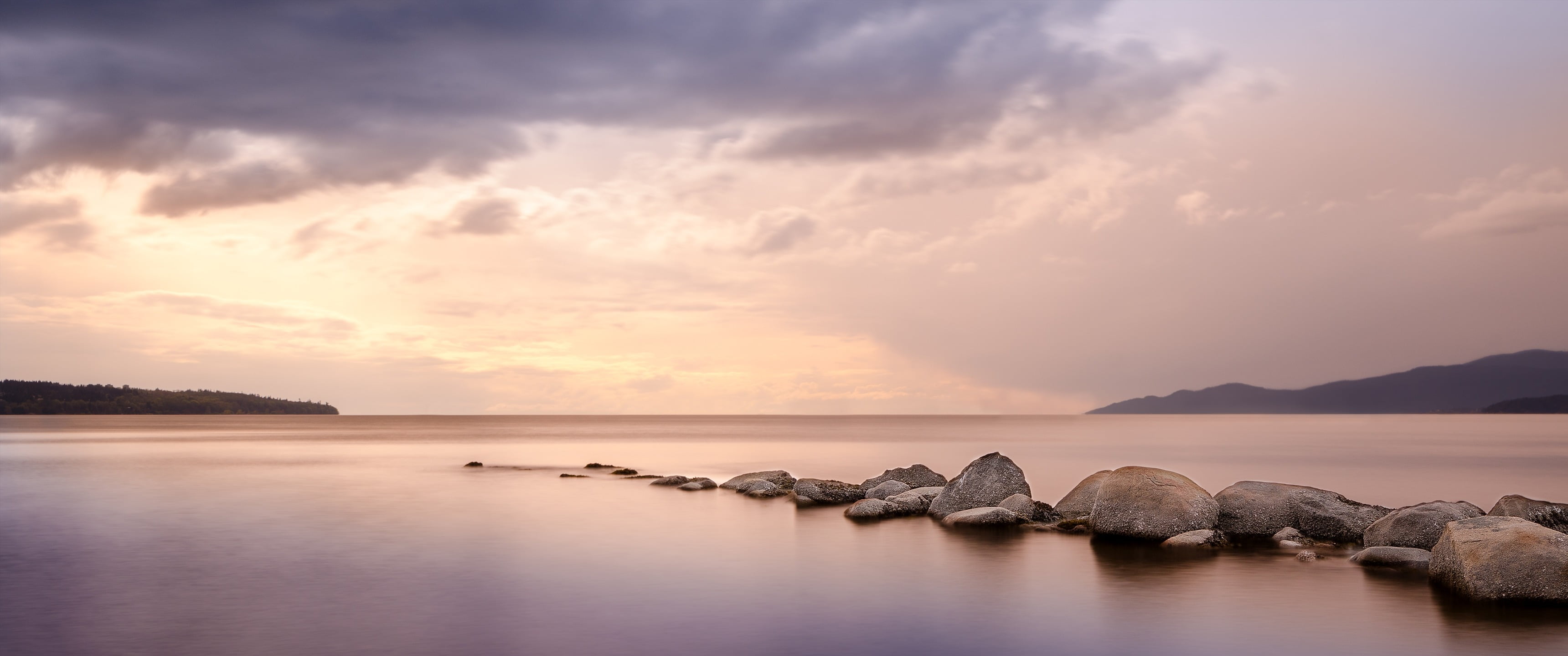 rocks on body of water wallpaper ultrawide landscape nature 2k