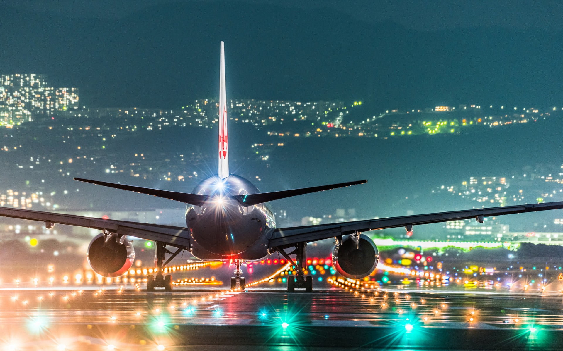gray airplane white at airport during nighttime landscape 2k