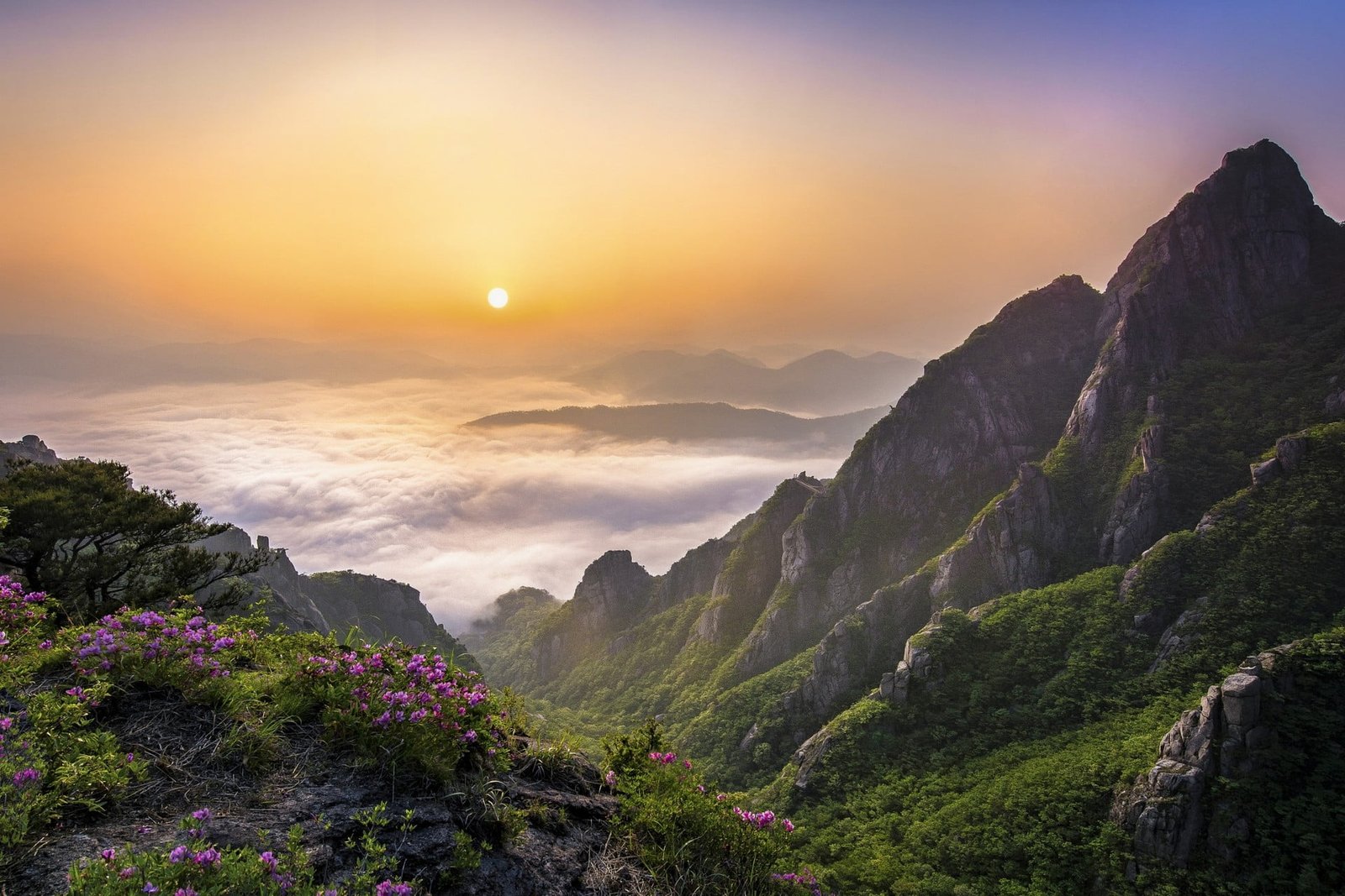 green mountain during sunset morning mountains clouds nature 2k
