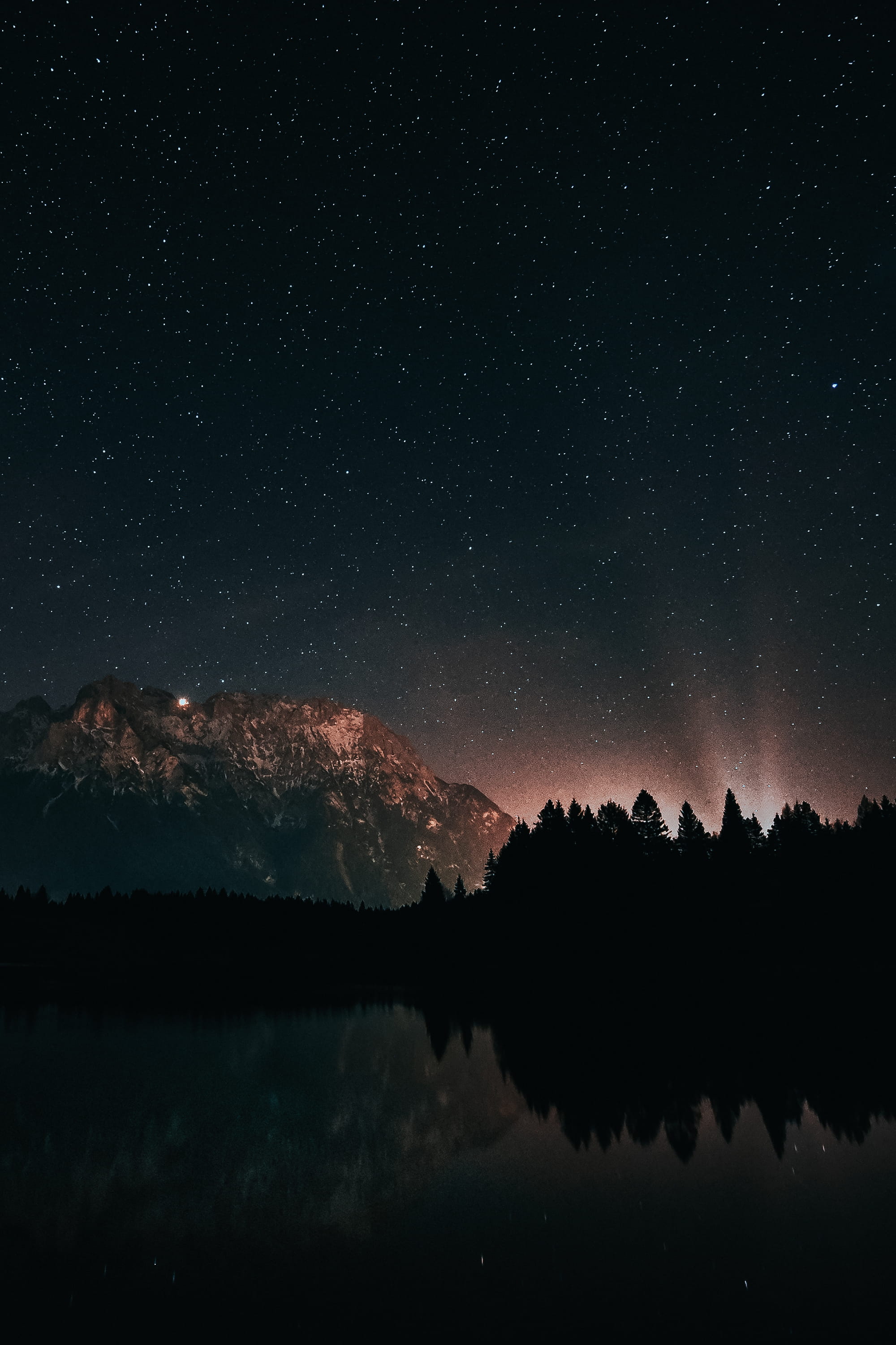 starry night scenery forest mountain sky blue red light 2k
