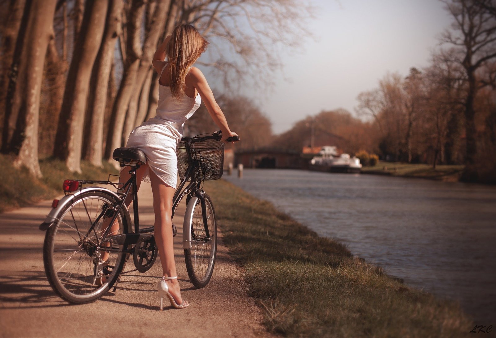 women's white dress blonde high heels women outdoors bicycle 2k