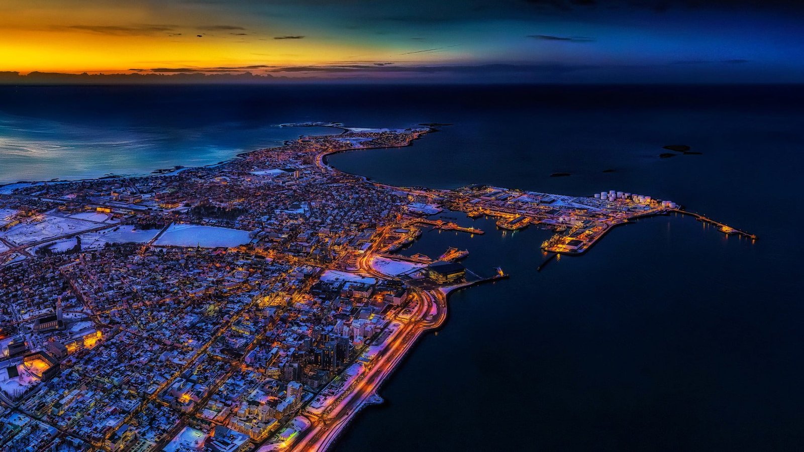 city landscape aerial view photography of building lot near body water 2k