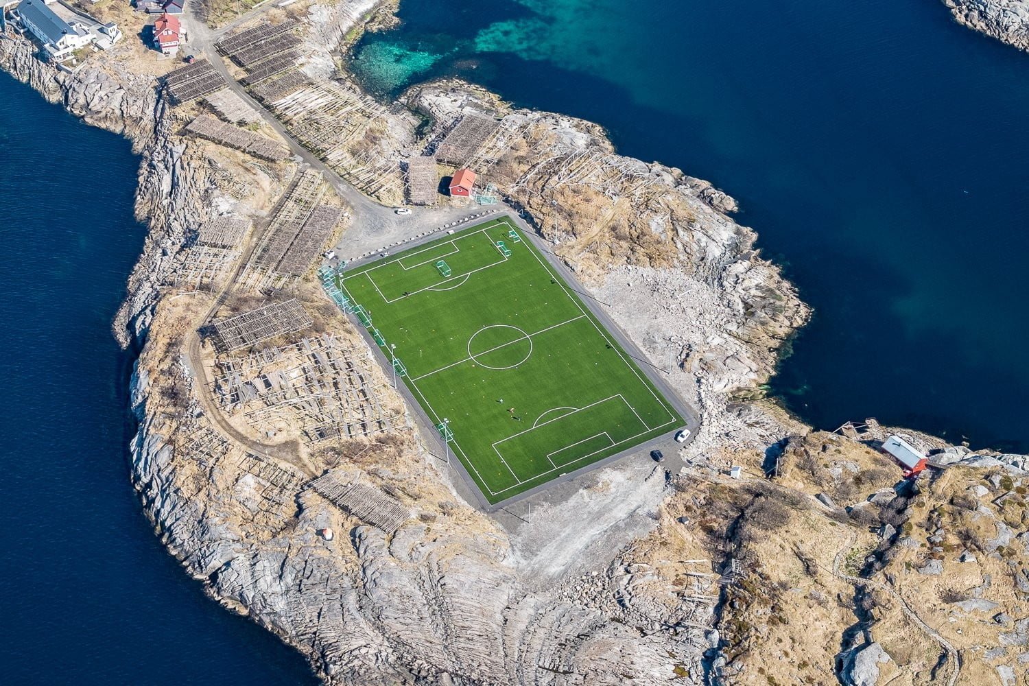 green soccer field landscape pitches sea Lofoten Islands 2k