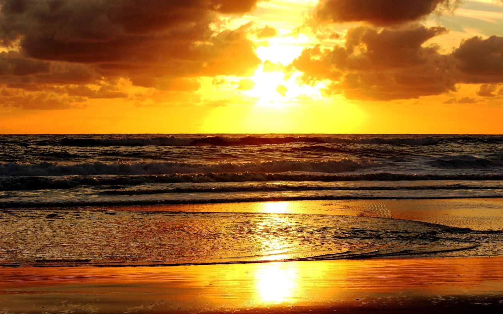 Sunset On The Beach ocean nature clouds glare yellow water 2k