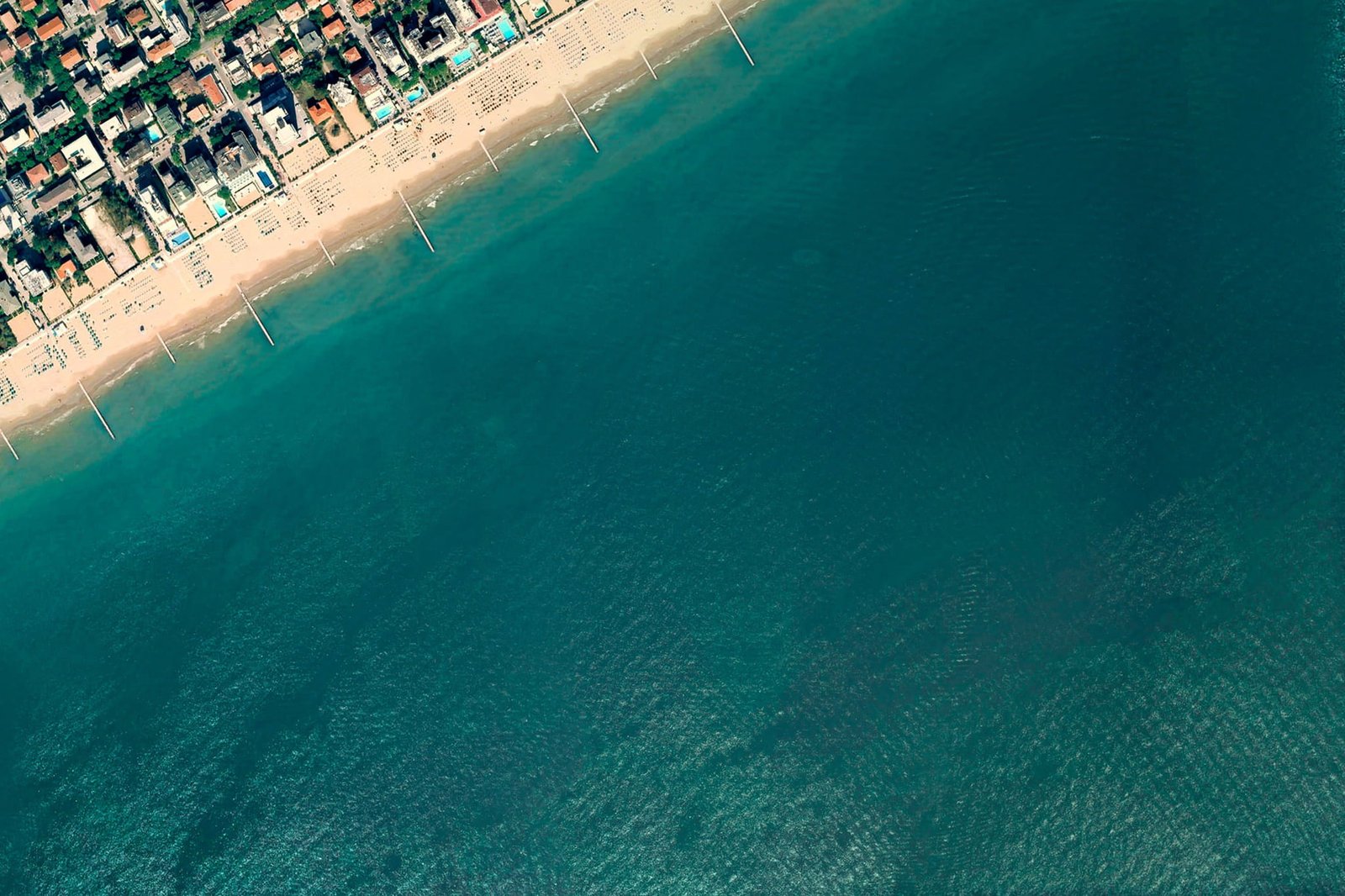 aerial photo of sea and urban city Android Google Wallpaper 2k