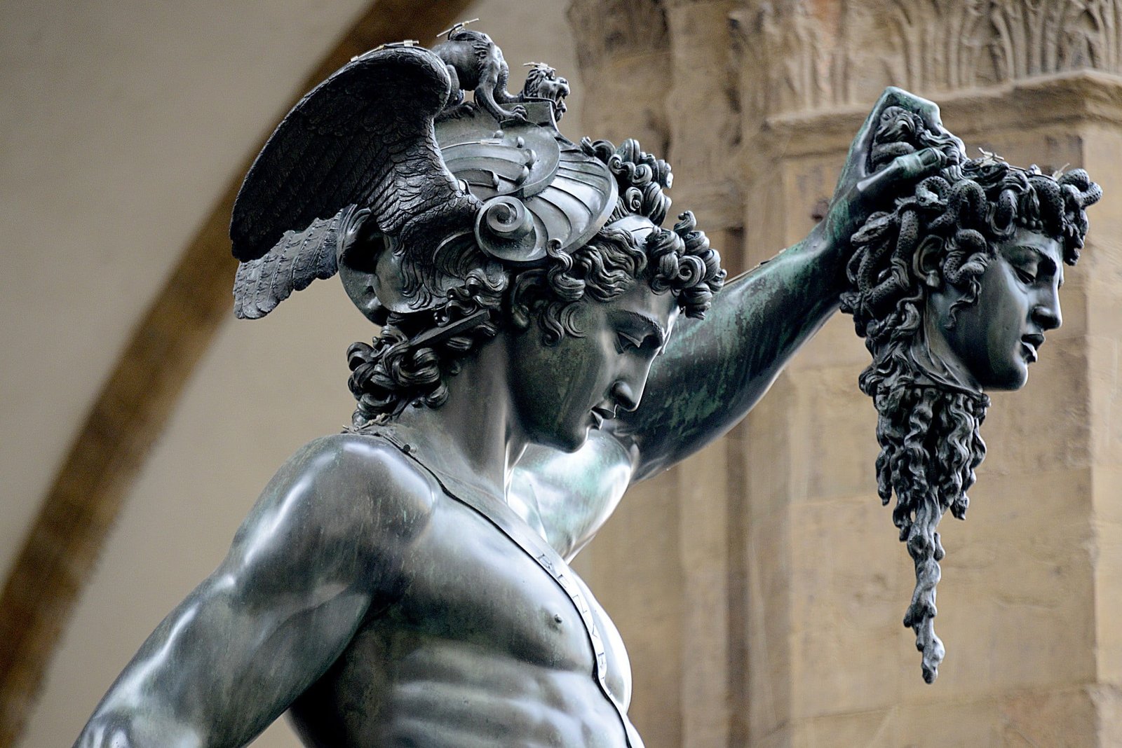 man holding head statue Italy face architecture snake Medusa 2k
