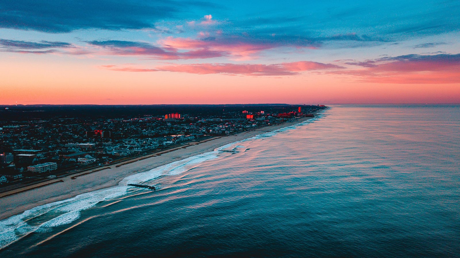 body of water aerial view photo buildings near 2k