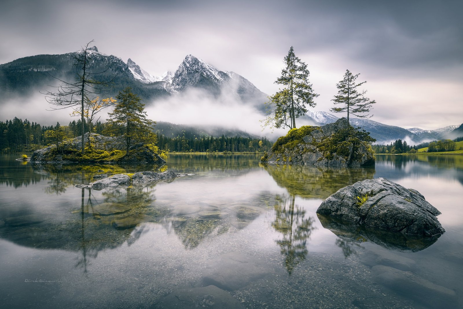 landscape photography of lake near foggy mountain mountains 2k