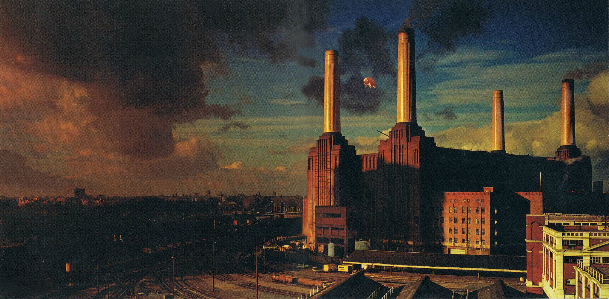 brown high rise building Pink Floyd animals London pigs album covers 2k