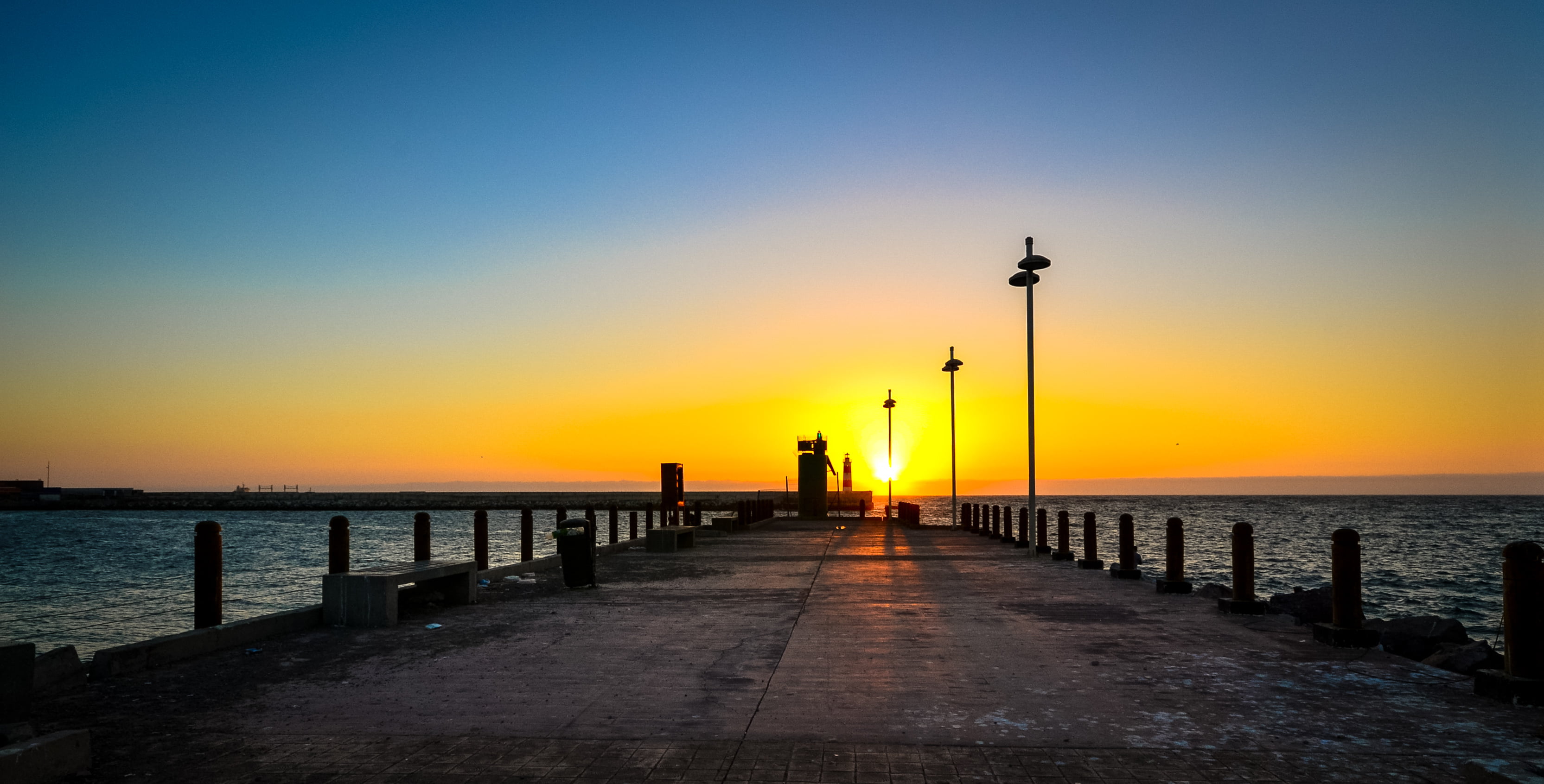 landscape photography of dock beside body water Fugaz antofagasta chile 2k