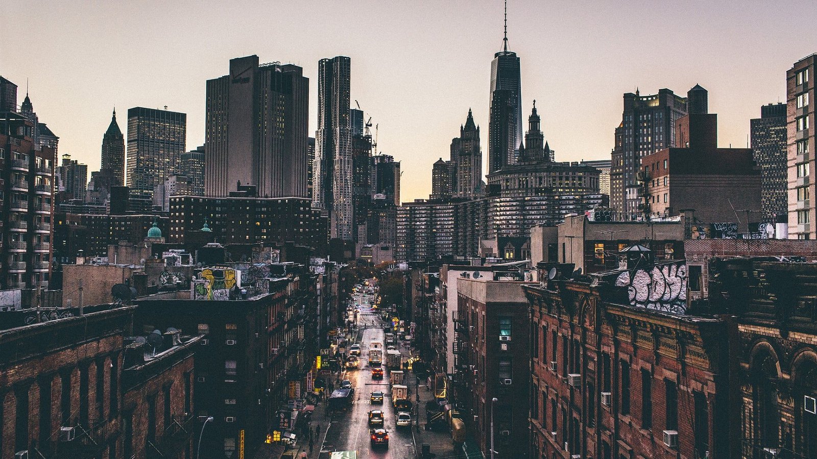 aerial view of buildings and cars city during golden hour 2k