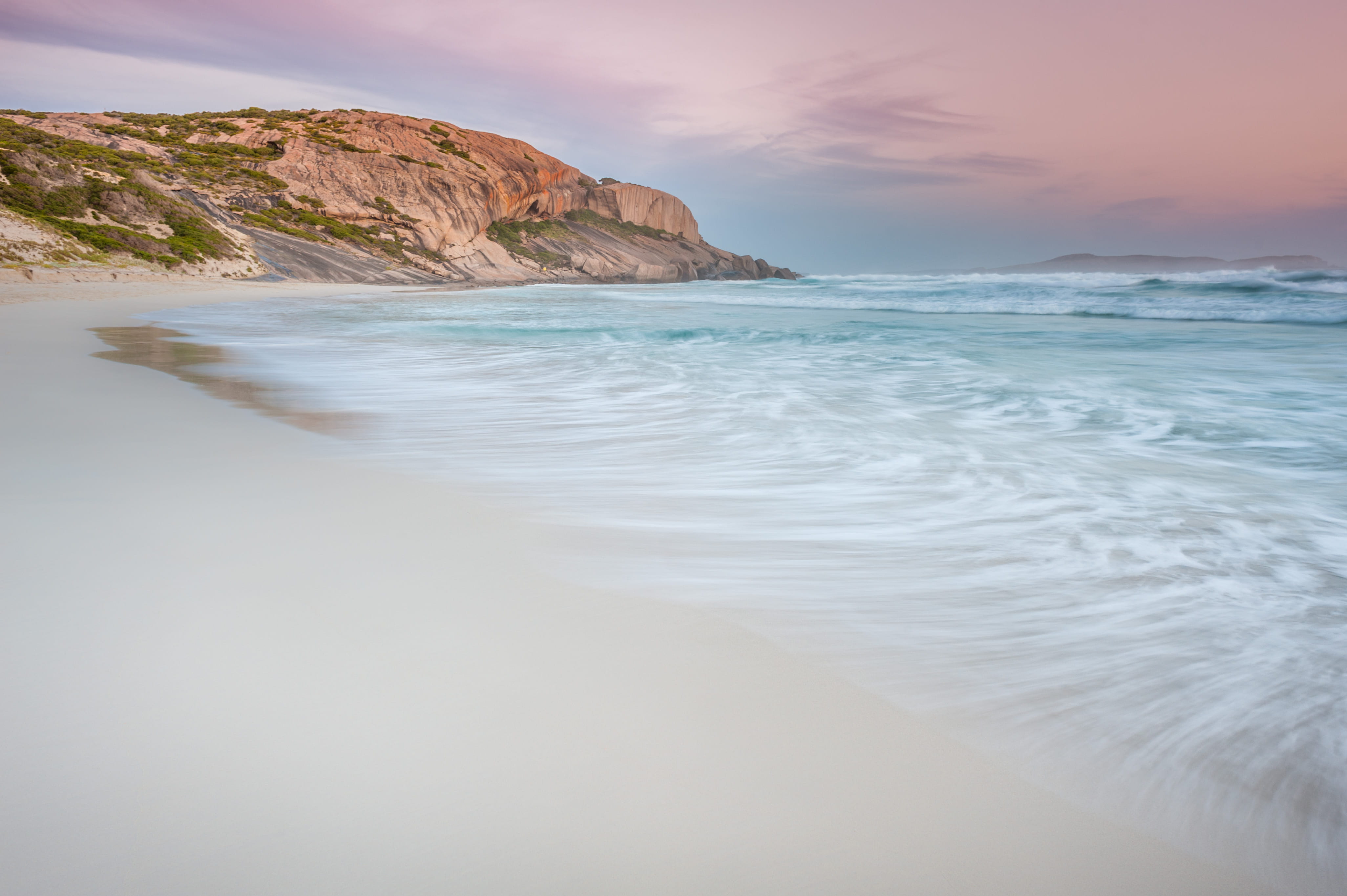 time lapse photography of beach during daytime white shore under gray sky 2k 4k
