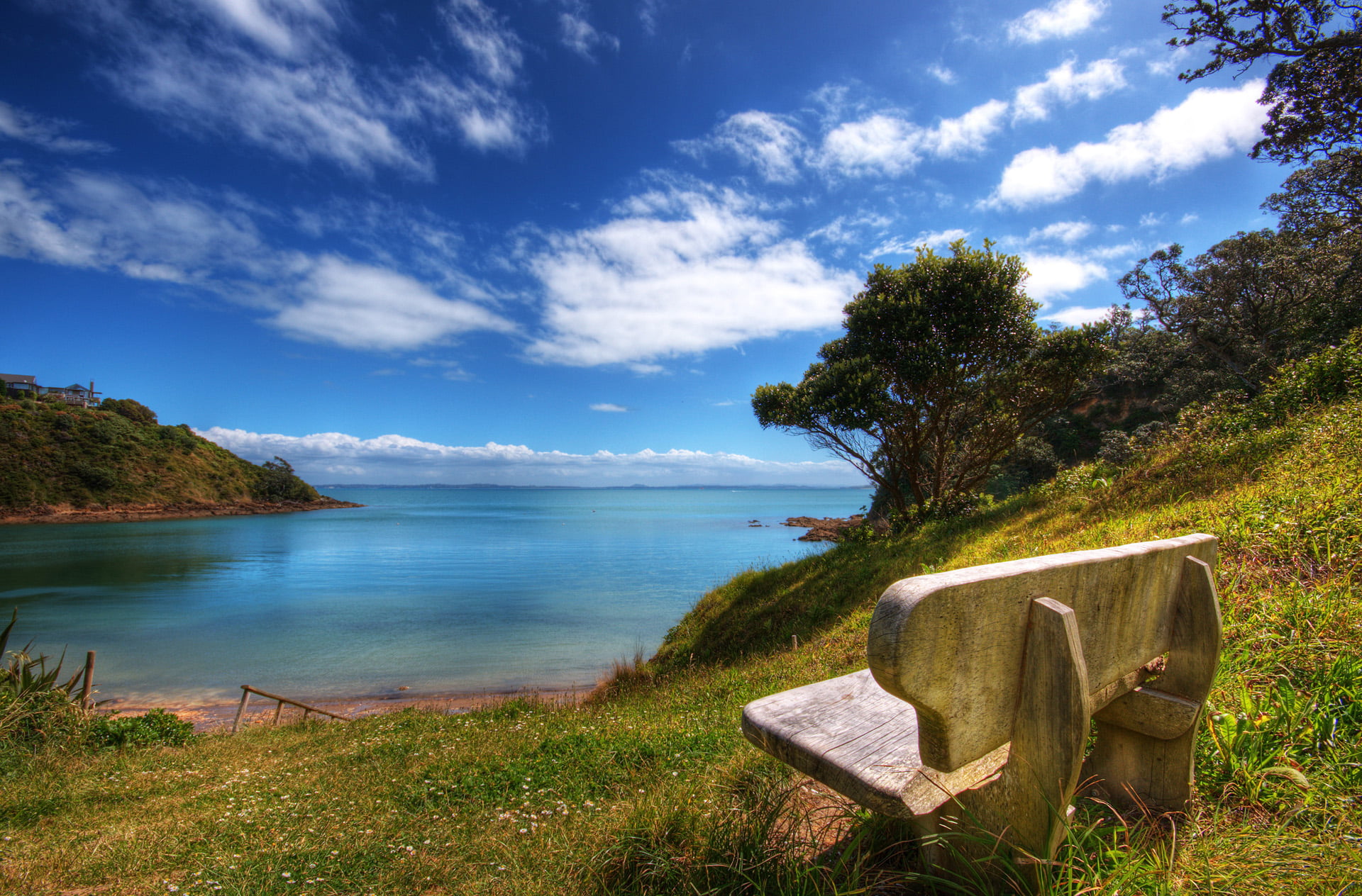 bench on land near beach during daytime Lookout water ocean sea 2k
