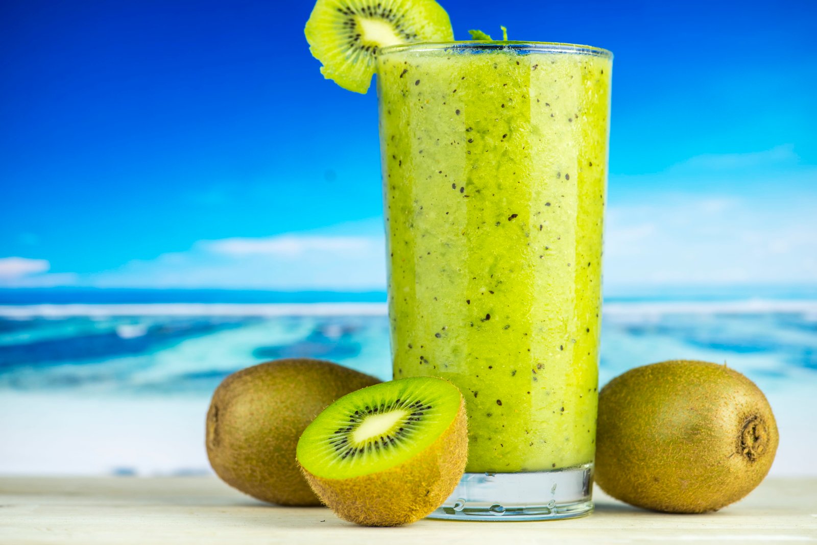 Kiwi Fruit Beside Drinking Glass Filled With Shake beach 2k 4k