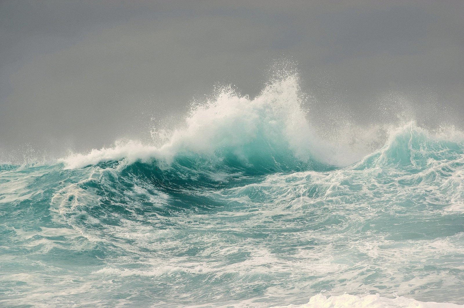 waving seashore wallpaper body of water waves overcast storm 2k