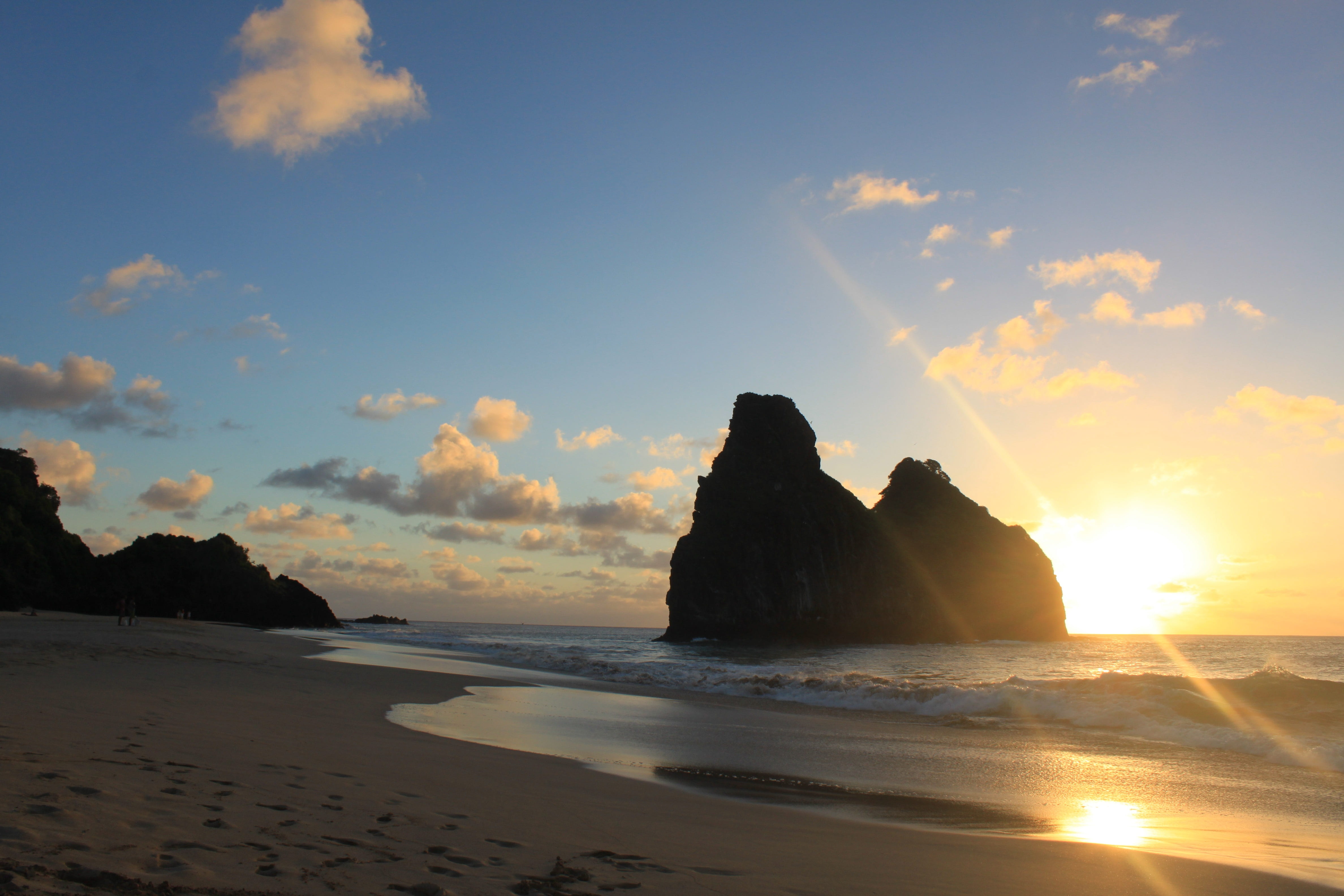 silhouette of rock formations on sea sunset noronha fernando de 2k 4k 5k