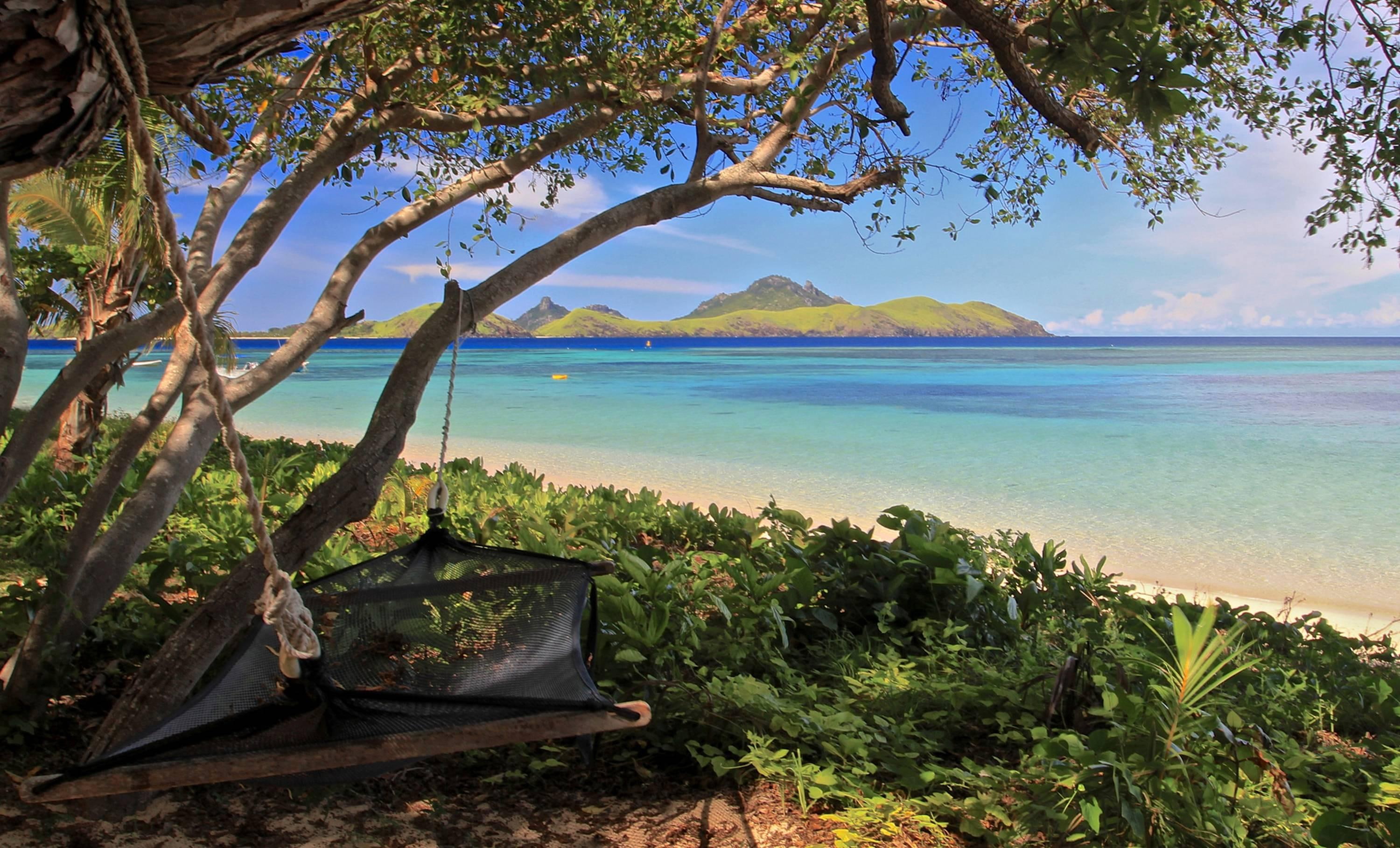 Hammock on Beach Fiji view island tropical lagoon south pacific 2k
