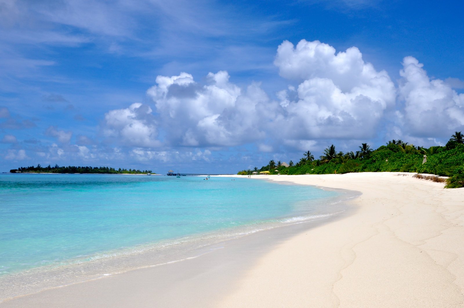 seashore under white clouds maldives beach sand summer island 2k 4k