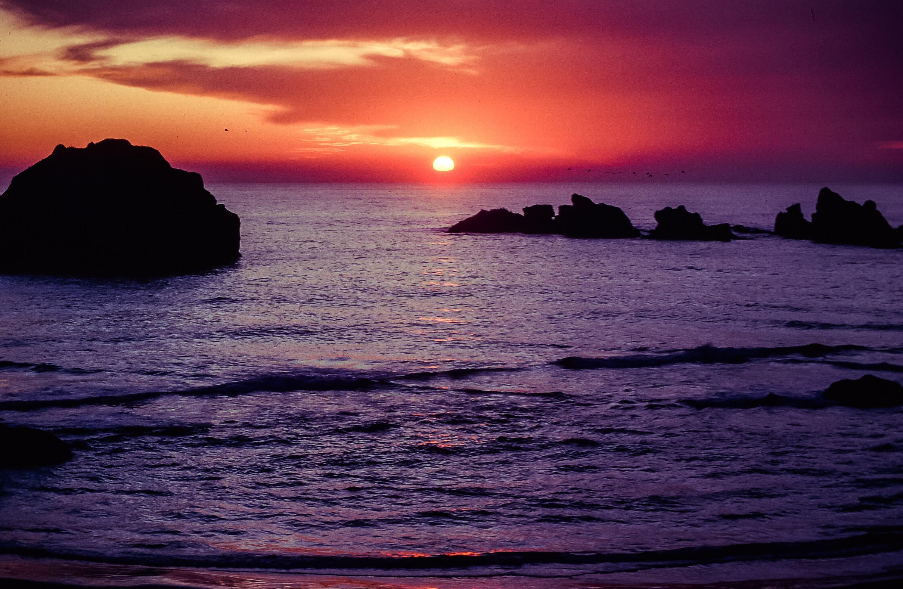Sunset over the coast of Bandon Beach in Oregon USA bright 2k