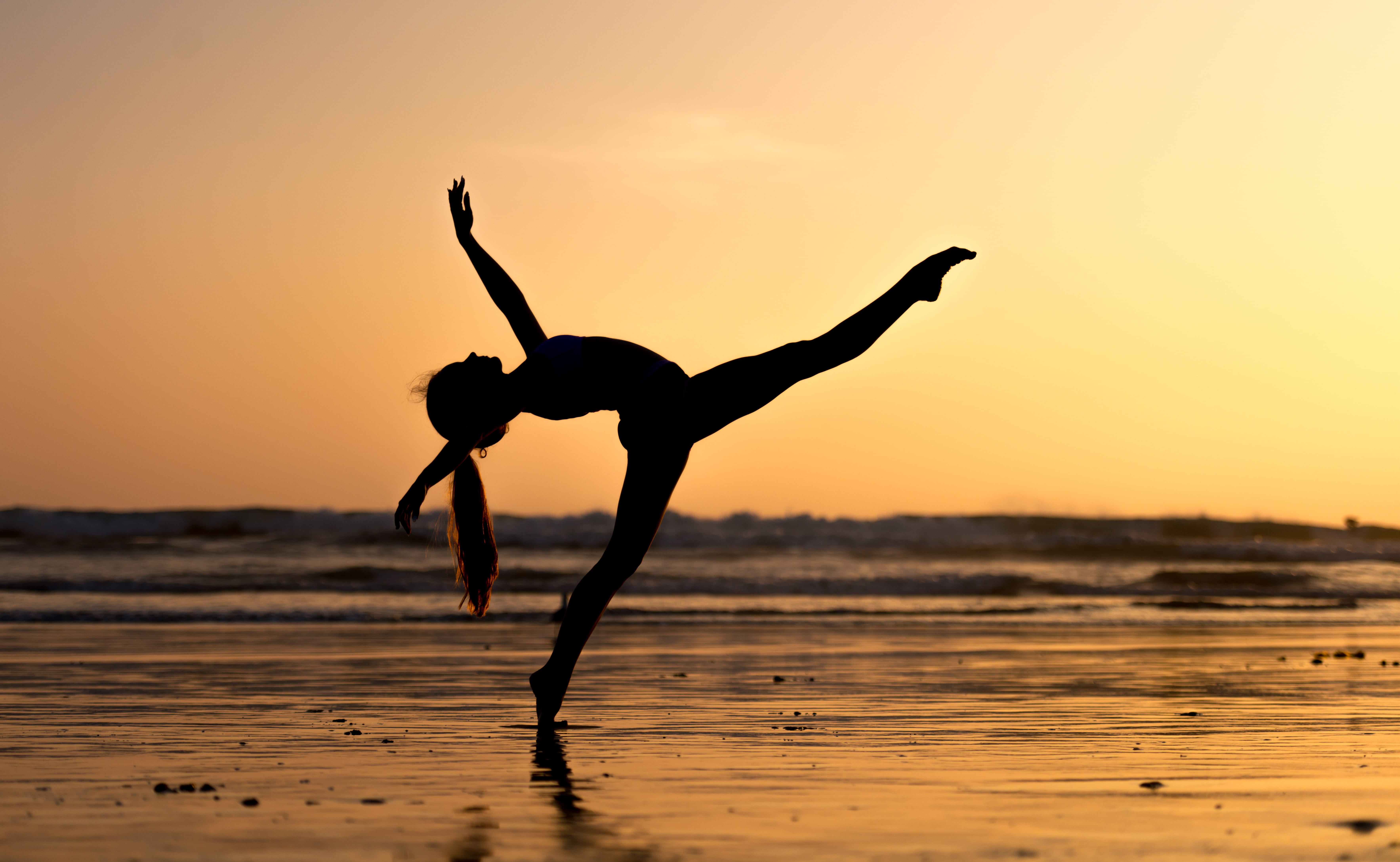 Ashi Ross in Huntington Beach woman doing ballerina pose near sea 2k 4k 5k