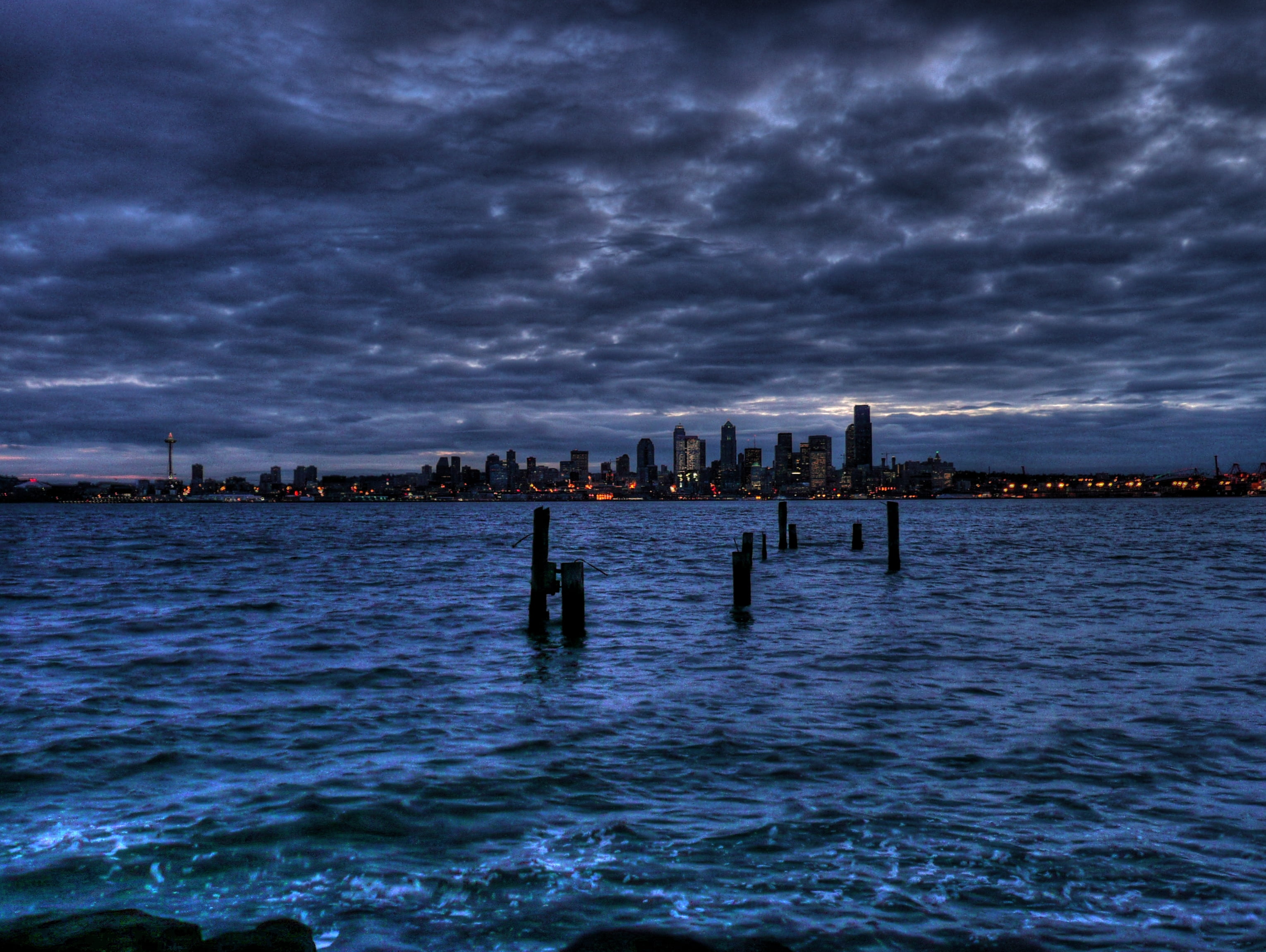 body of water during nighttime puget sound seattle 2k