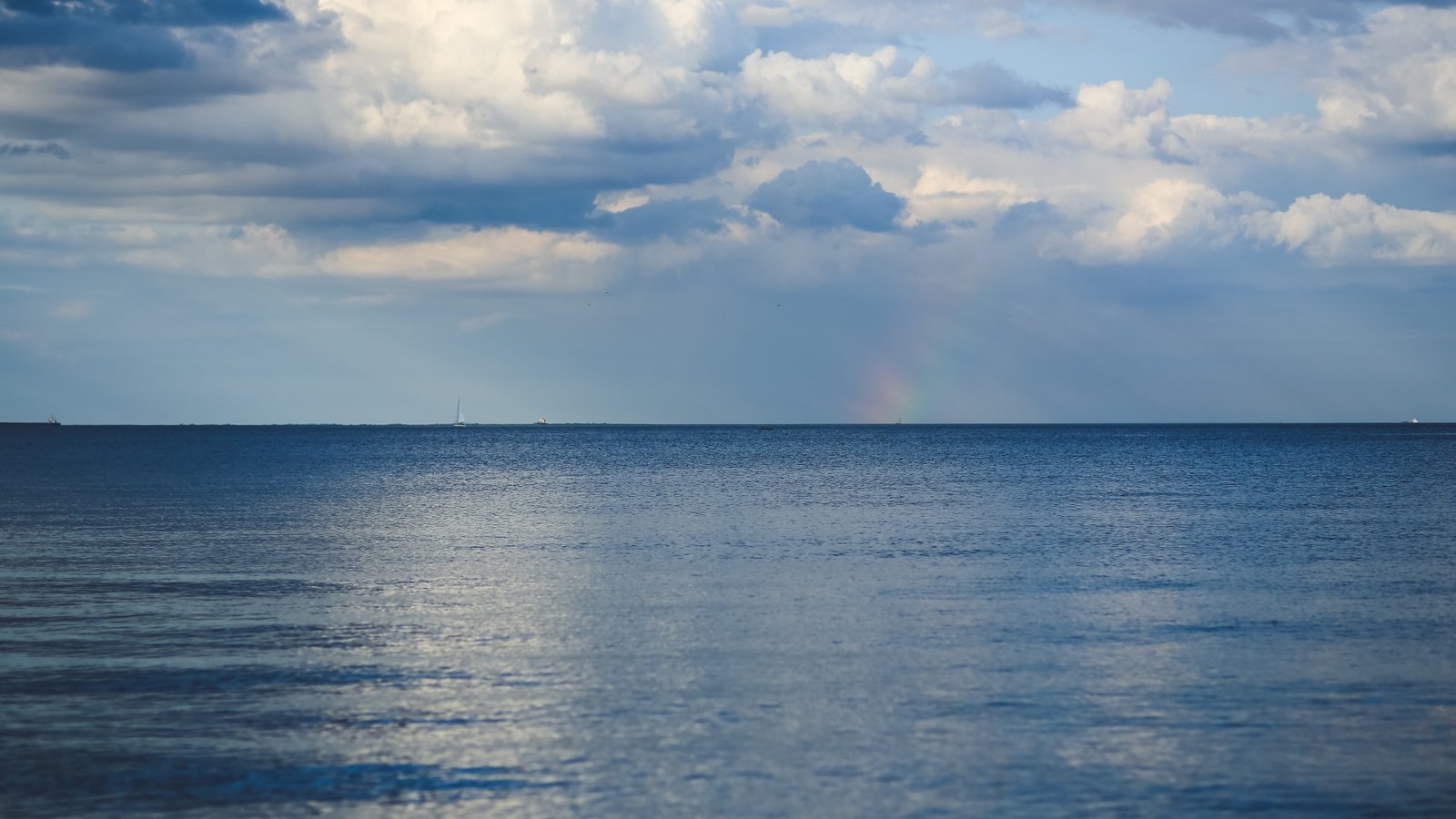 body of water under blue sky Baltic sea wallpaper 2k 4k 5k