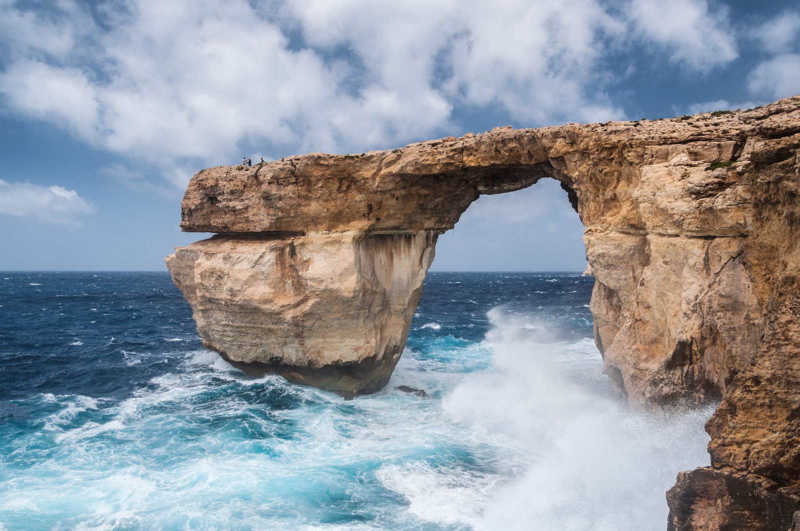 canyon mountain beside body of water malta gozo 2k 4k