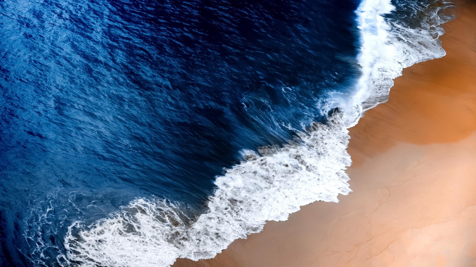 foam wave sea beach aerial view motion water beauty in nature 2k 4k