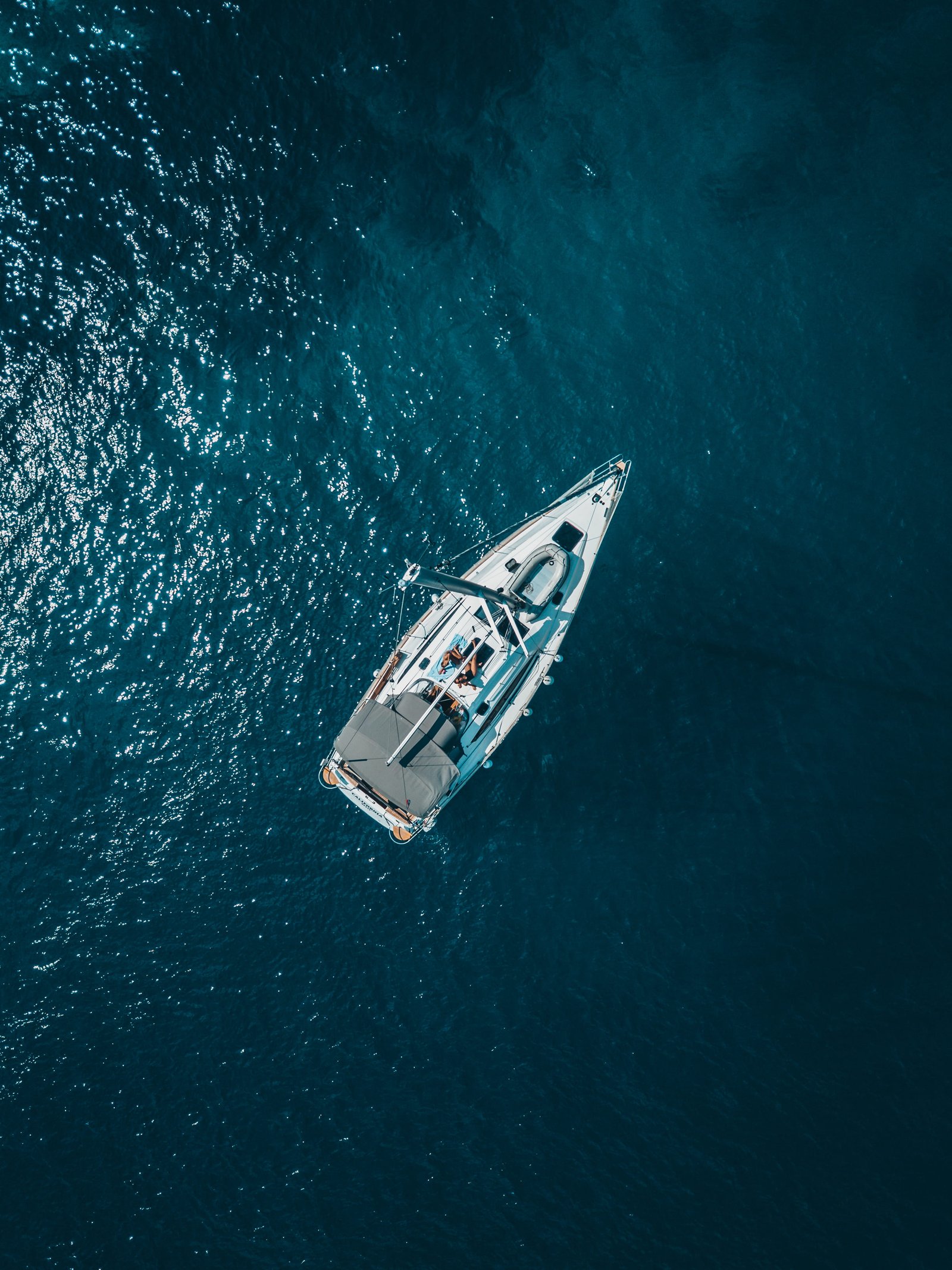 High Angle Photo of White Boat on Body Water aerial shot 2k