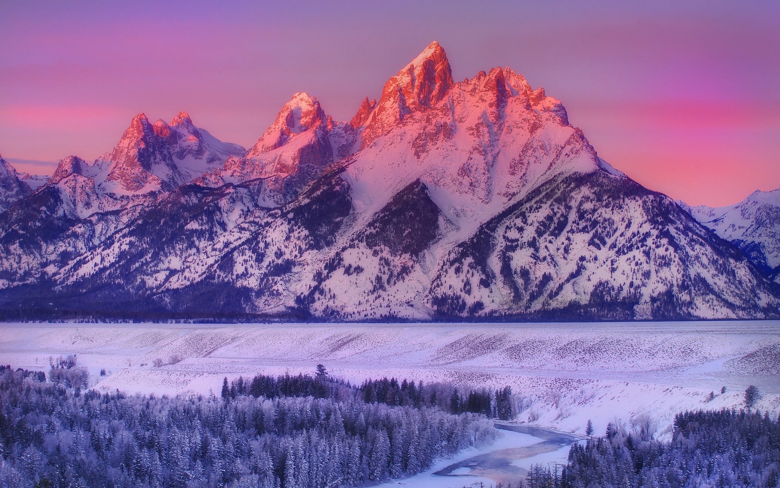 snow coned mountain covered mountains at golden hour winter 2k