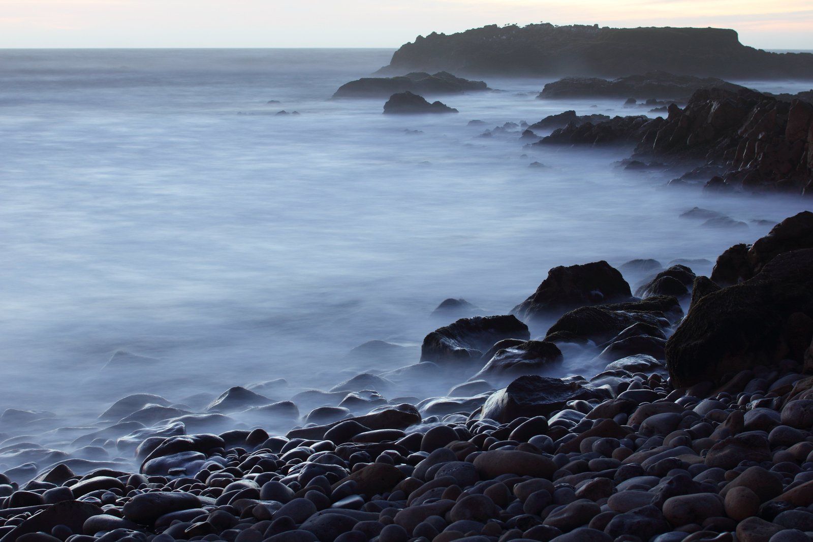 body of water beside gray rocks White Pescadero State Beach 2k 4k 5k
