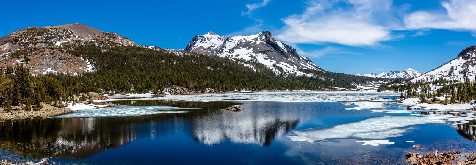 Mountains Near Body of Water Under Cloudy Sky daylight forest 2k 4k