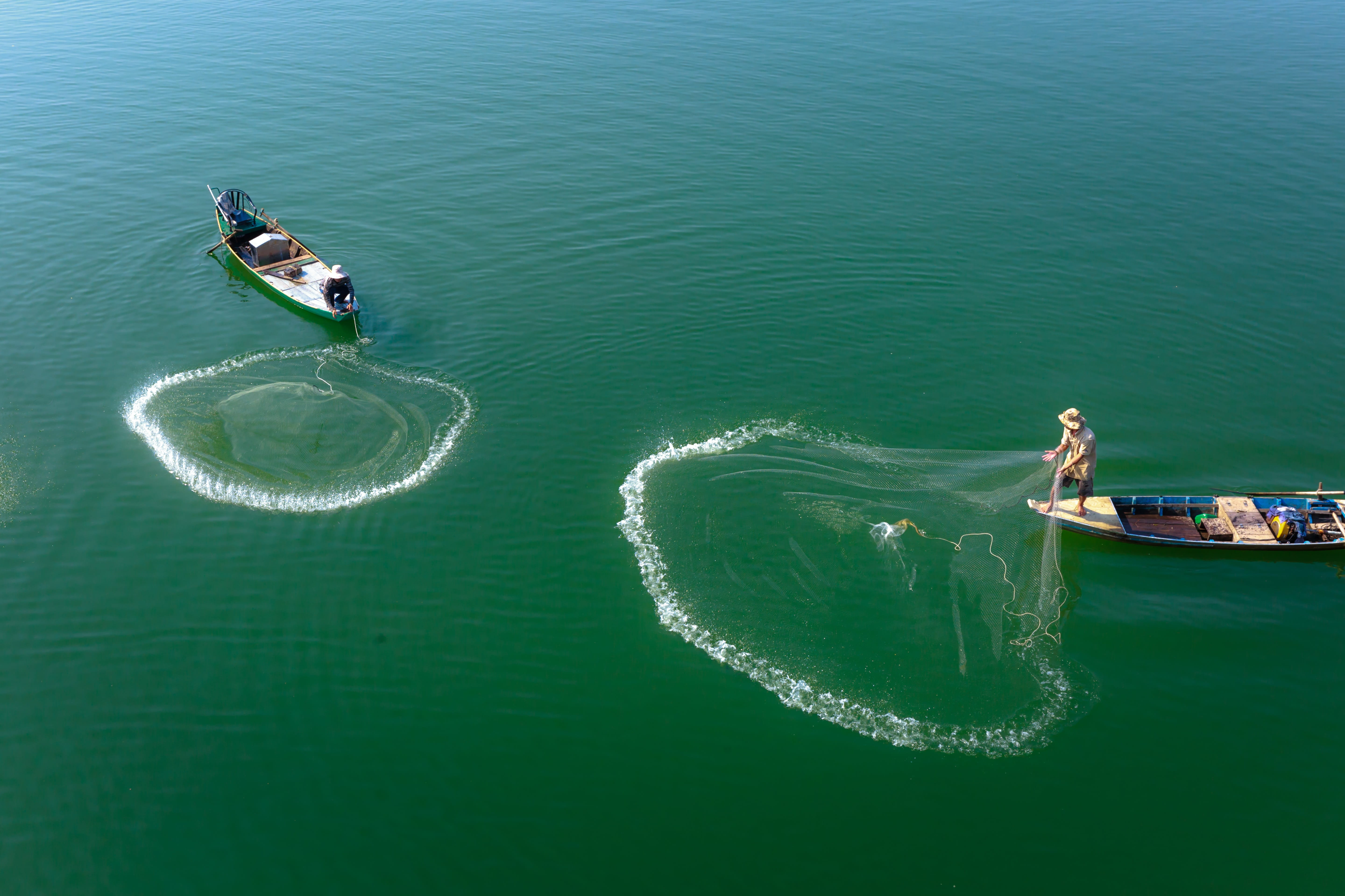 two boats on body of water throwing fish net outdoor fishing 2k 4k 5k