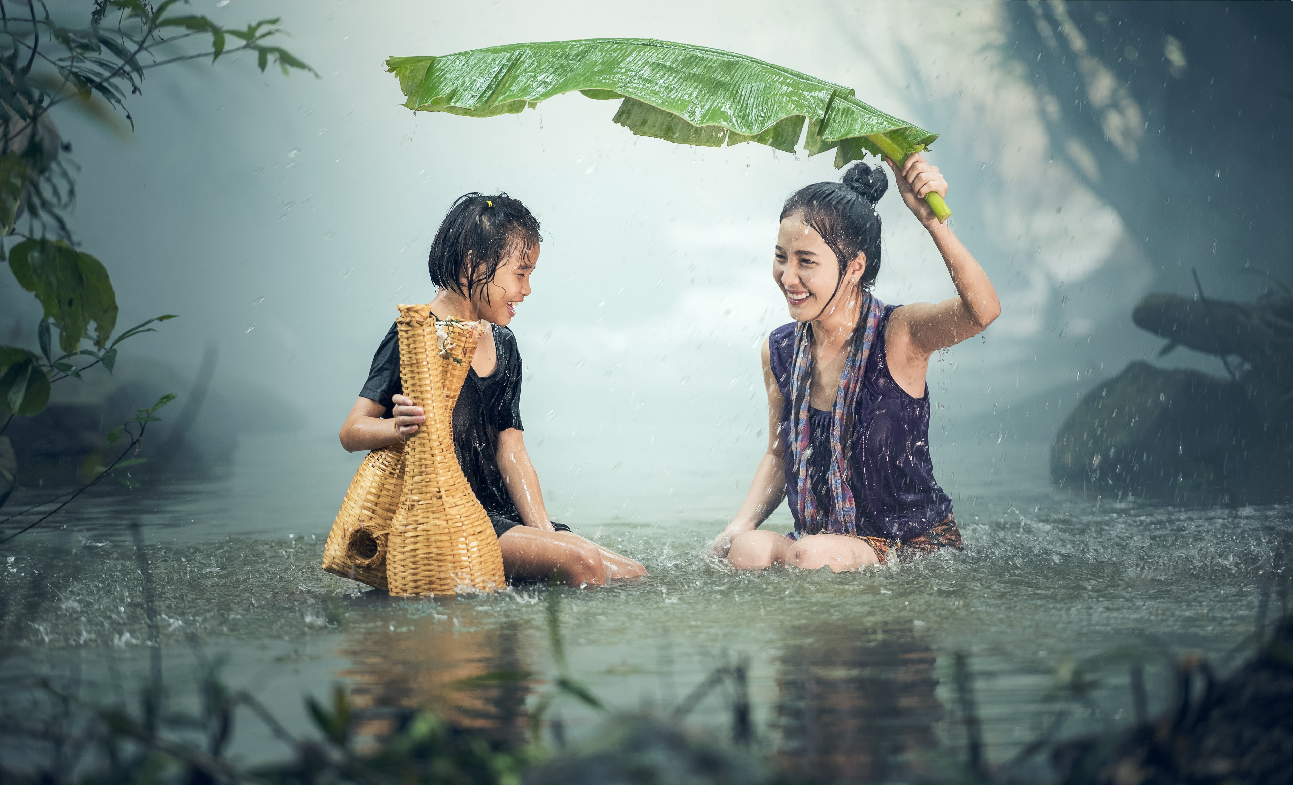 two women playing under the rain woman young pond background 2k 4k 5k