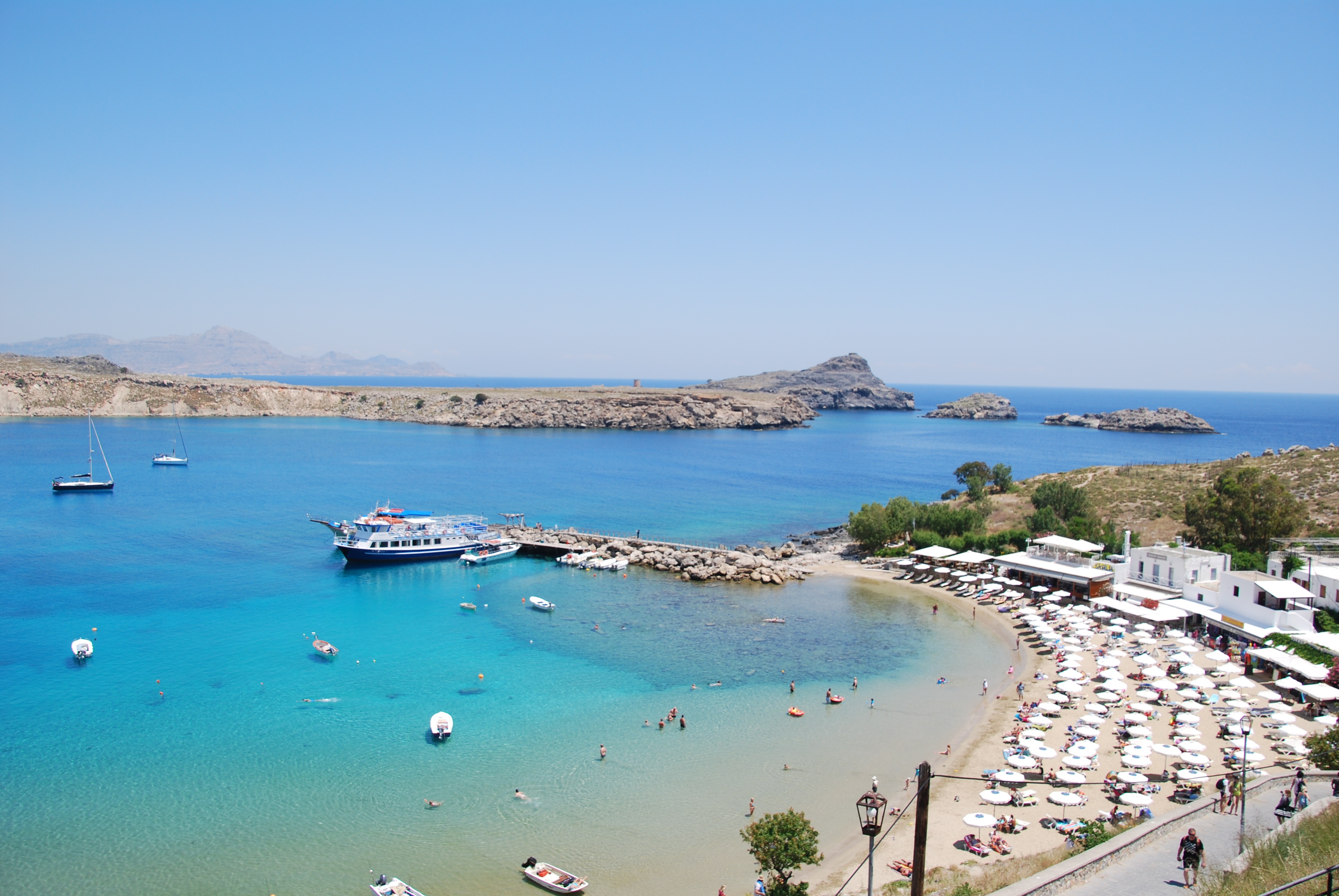 aerial photo of buildings and sea at daytime lindos beach rhodes 2k 4k