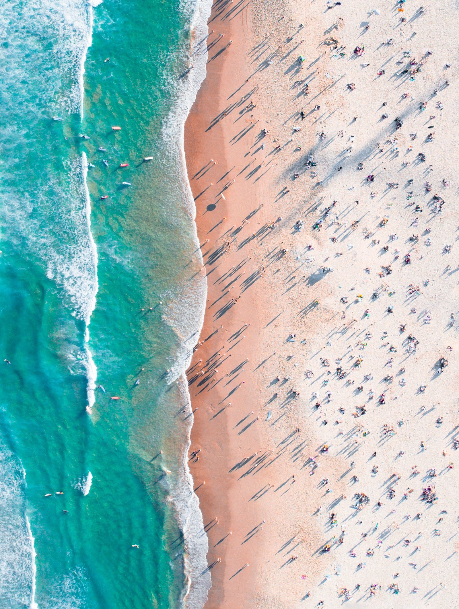 aerial photography of rocks near seashore beach shadow drone photo 2k