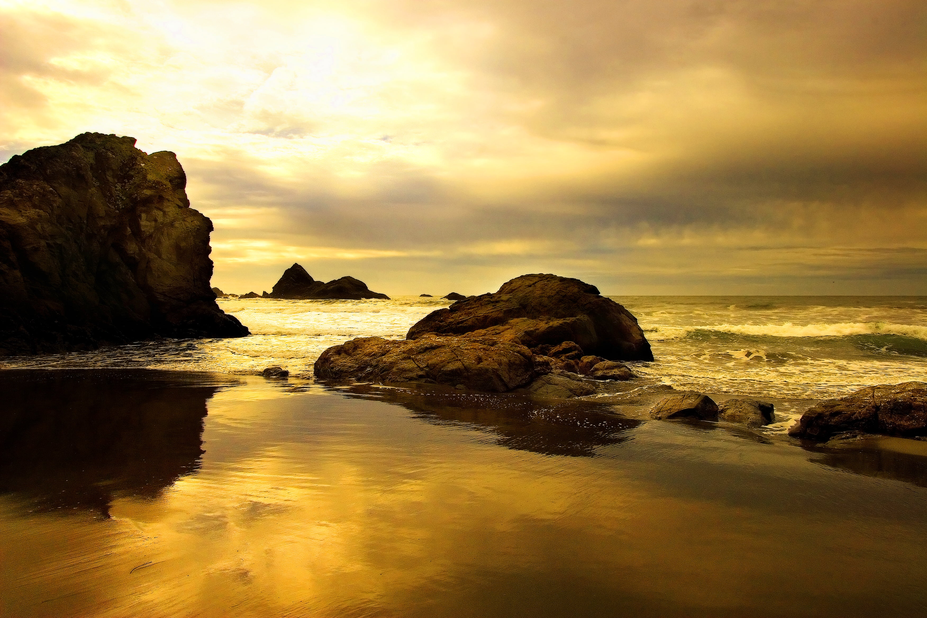 rock formation near body of water during daytime Lost Sensations 2k 4k