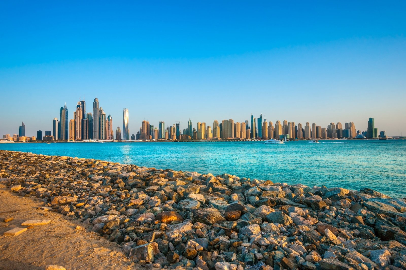 landscape photography of beach during daytime city cityscape 2k 4k
