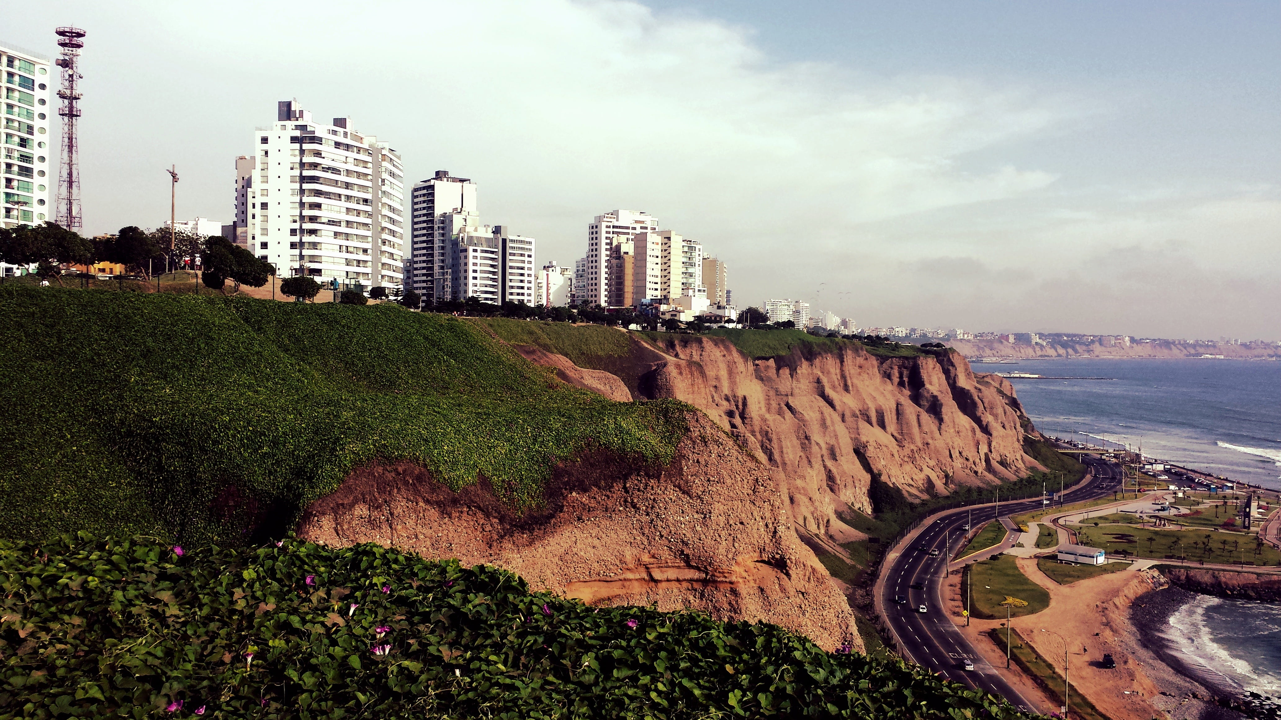 white high rise buildings and gray road at daytime lima peru 2k 4k
