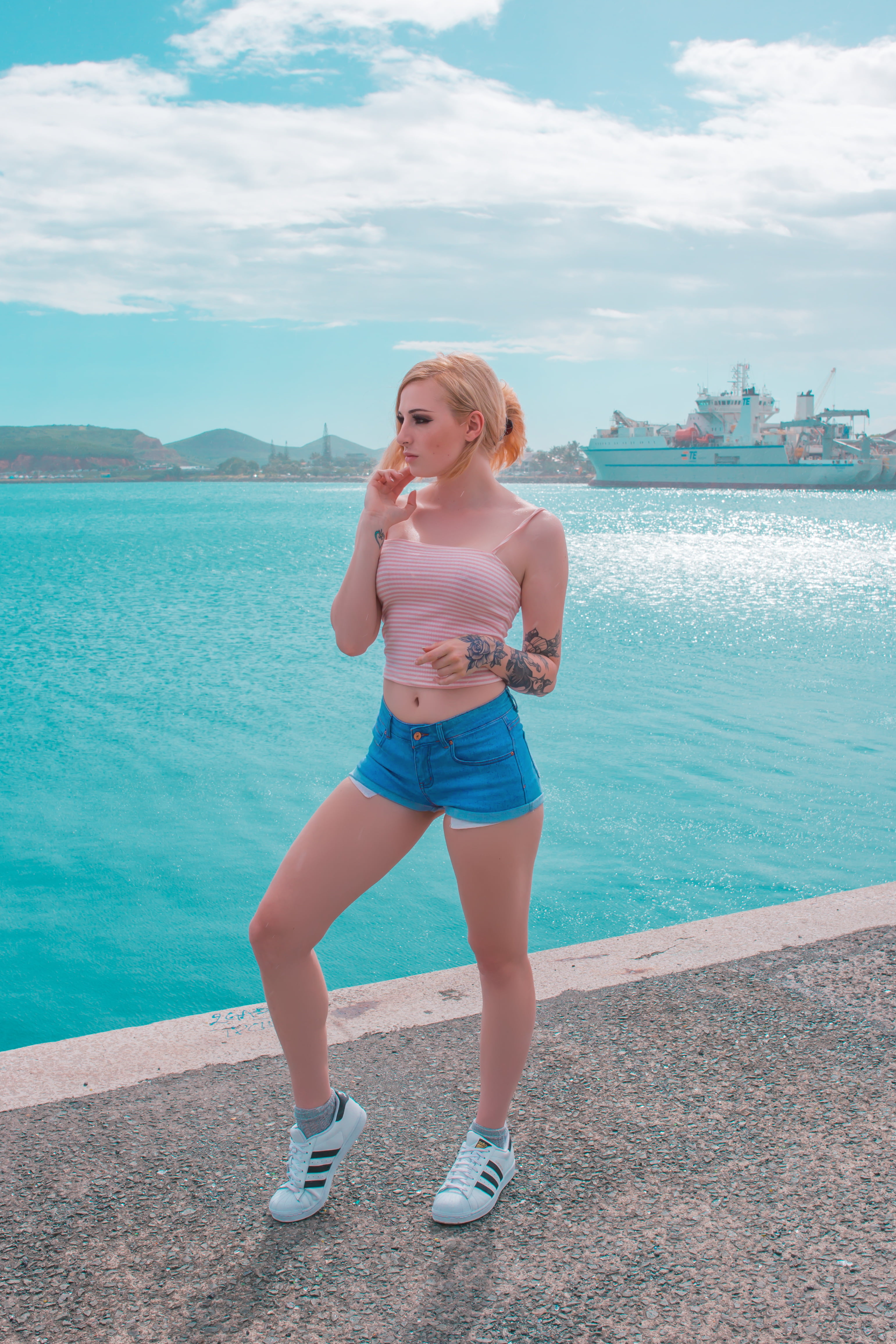 women s pink crop top camisole Kayla Erin model blonde looking into the distance 2k