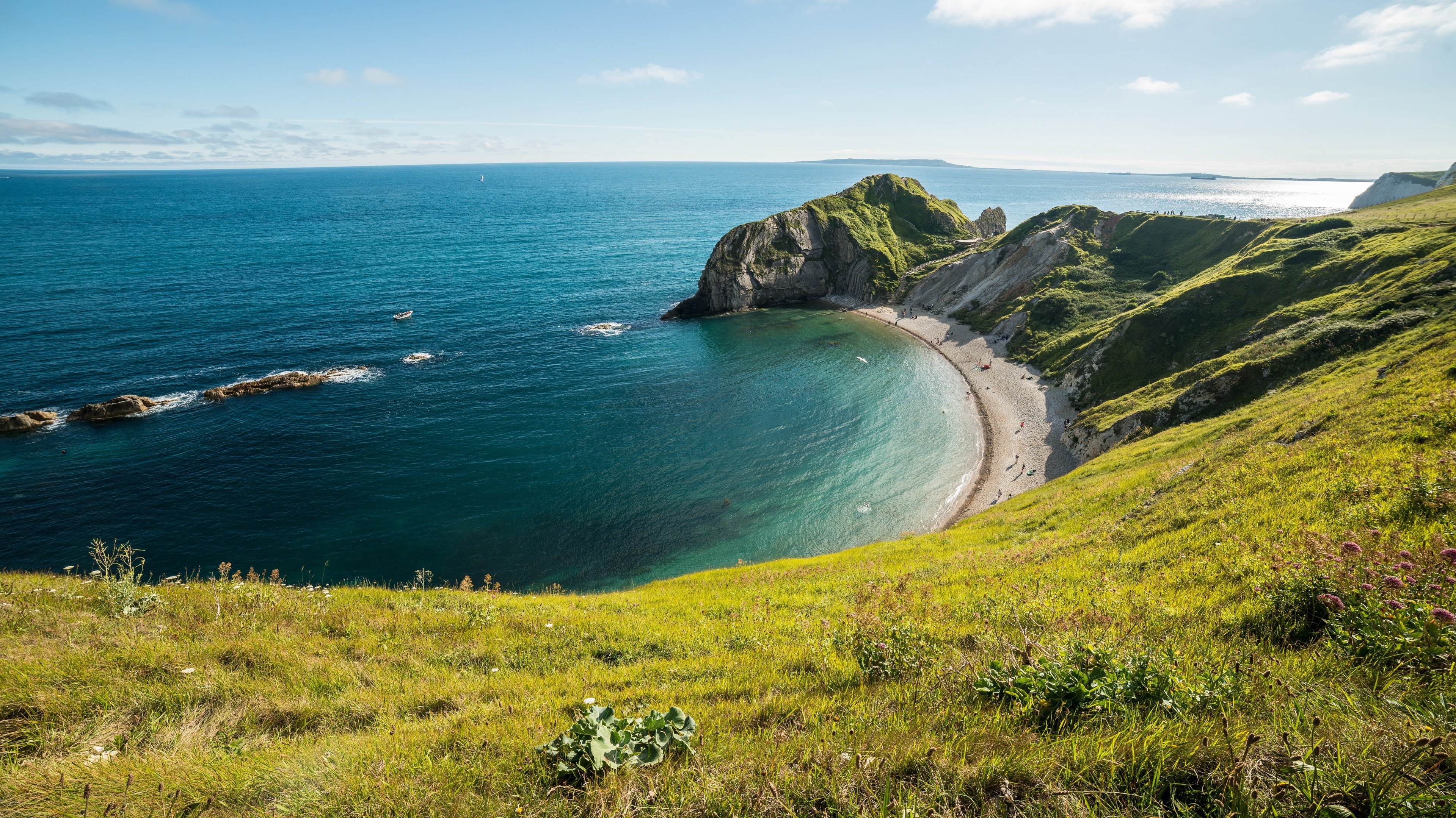 body of water and shore landscape Dorset coastline Durdle Door england 2k 4k
