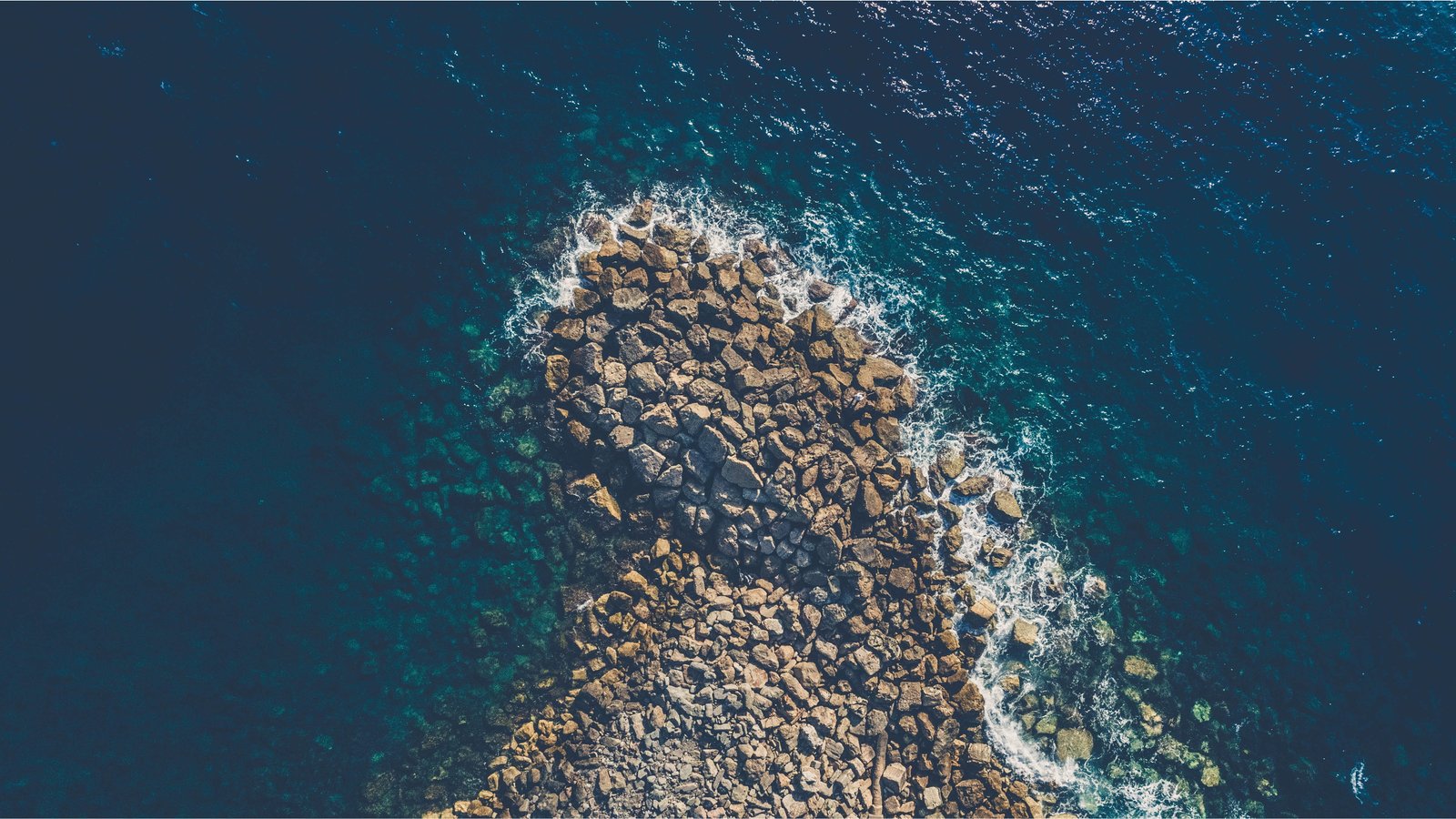 body of water aerial view sea coast rocks nature beach 2k 4k 5k