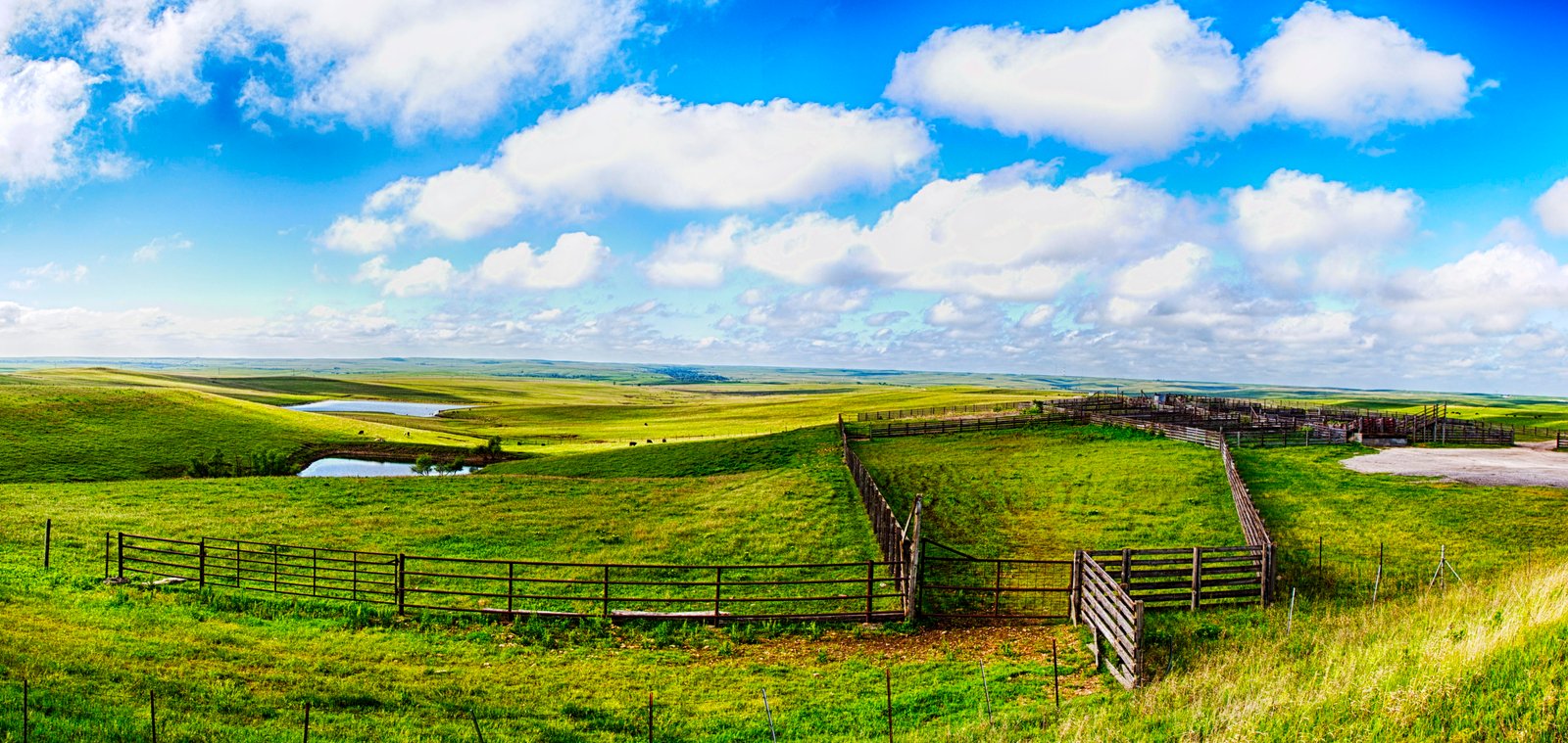 green grass field under white clouds and blue sky during daytime flint hills 2k 4k 5k