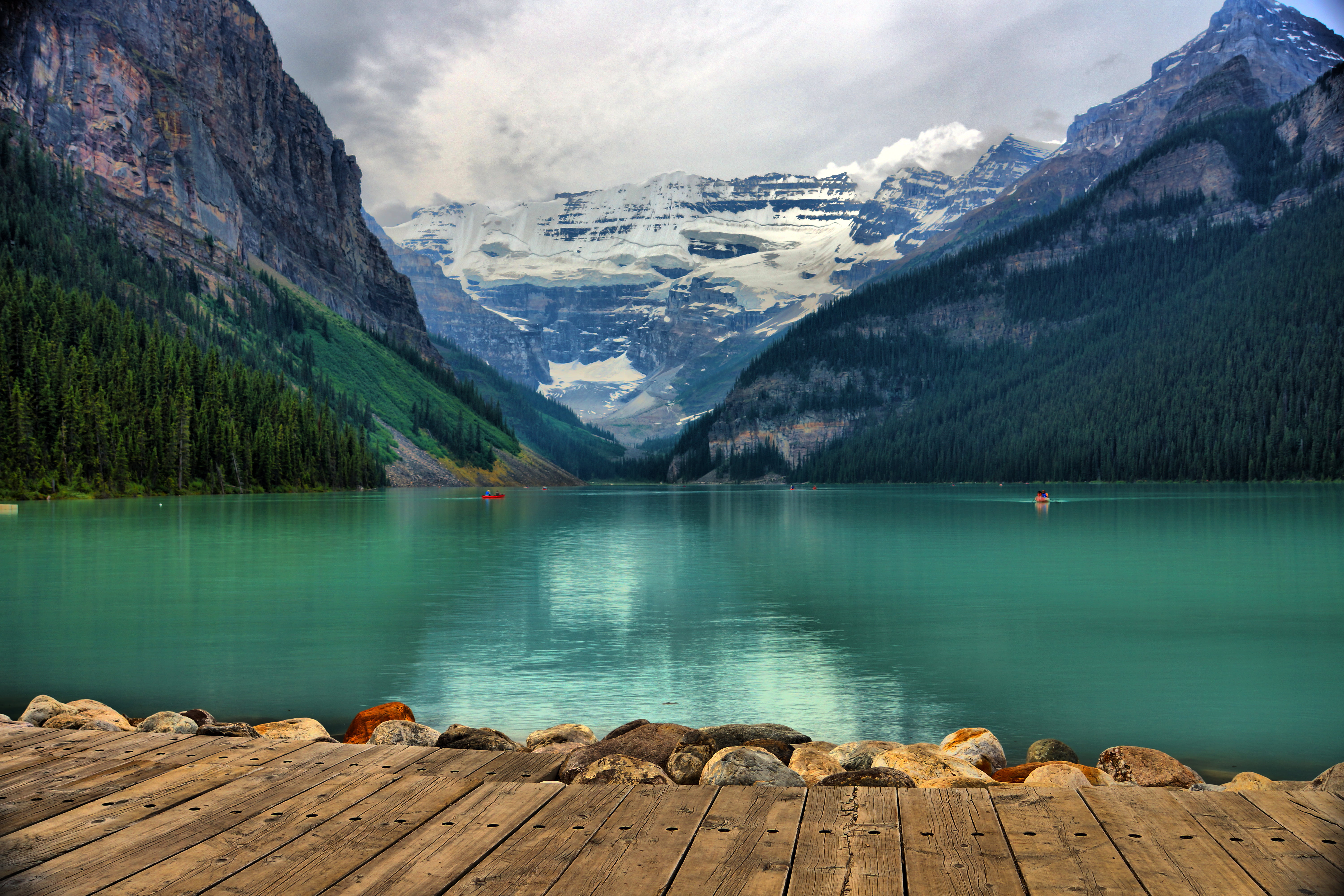 photography of calm water near mountain at daytime lake louise 2k 4k 5k