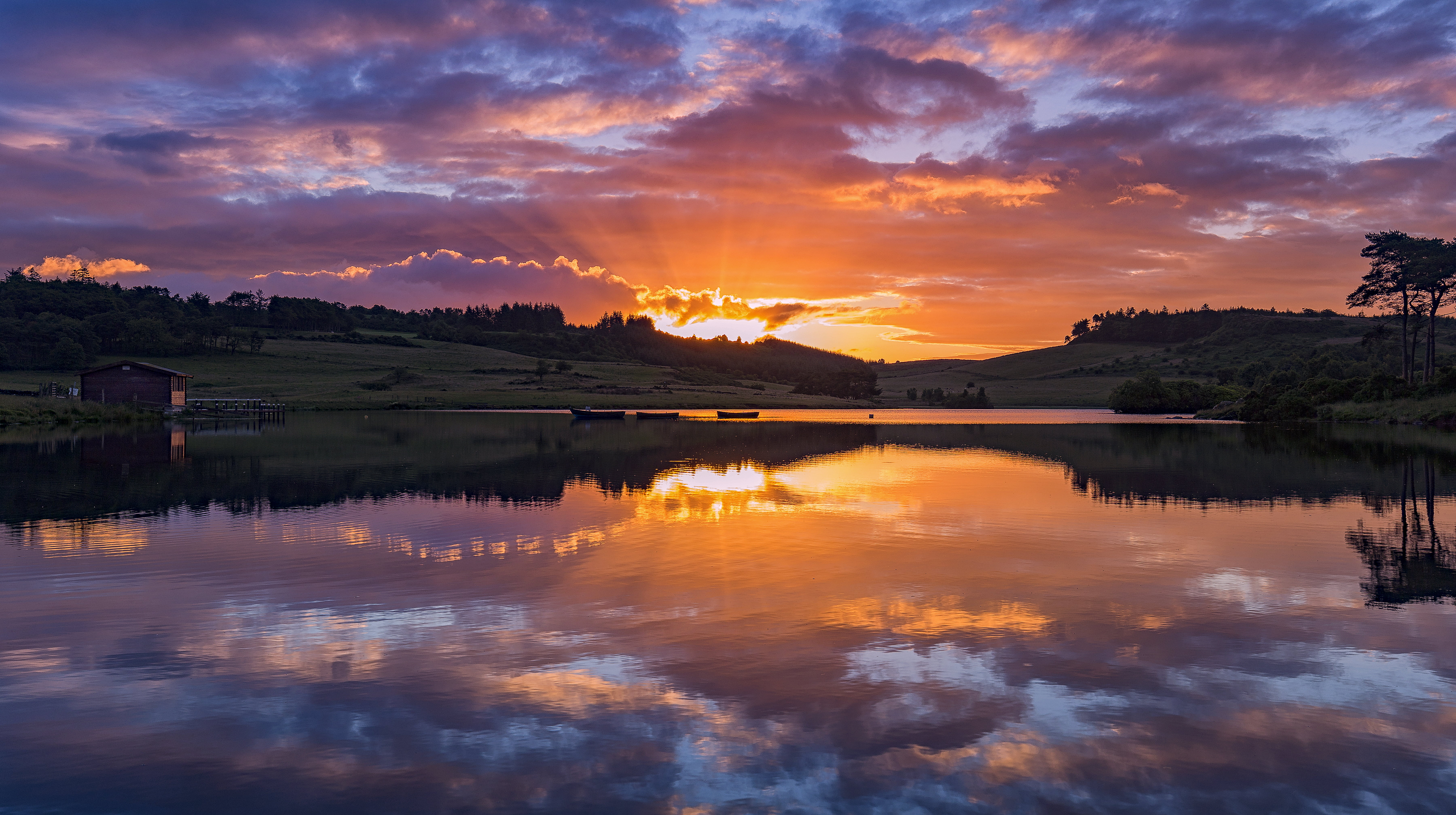 silhouette of mountain with body water at sunset Scotland 2k 4k 5k